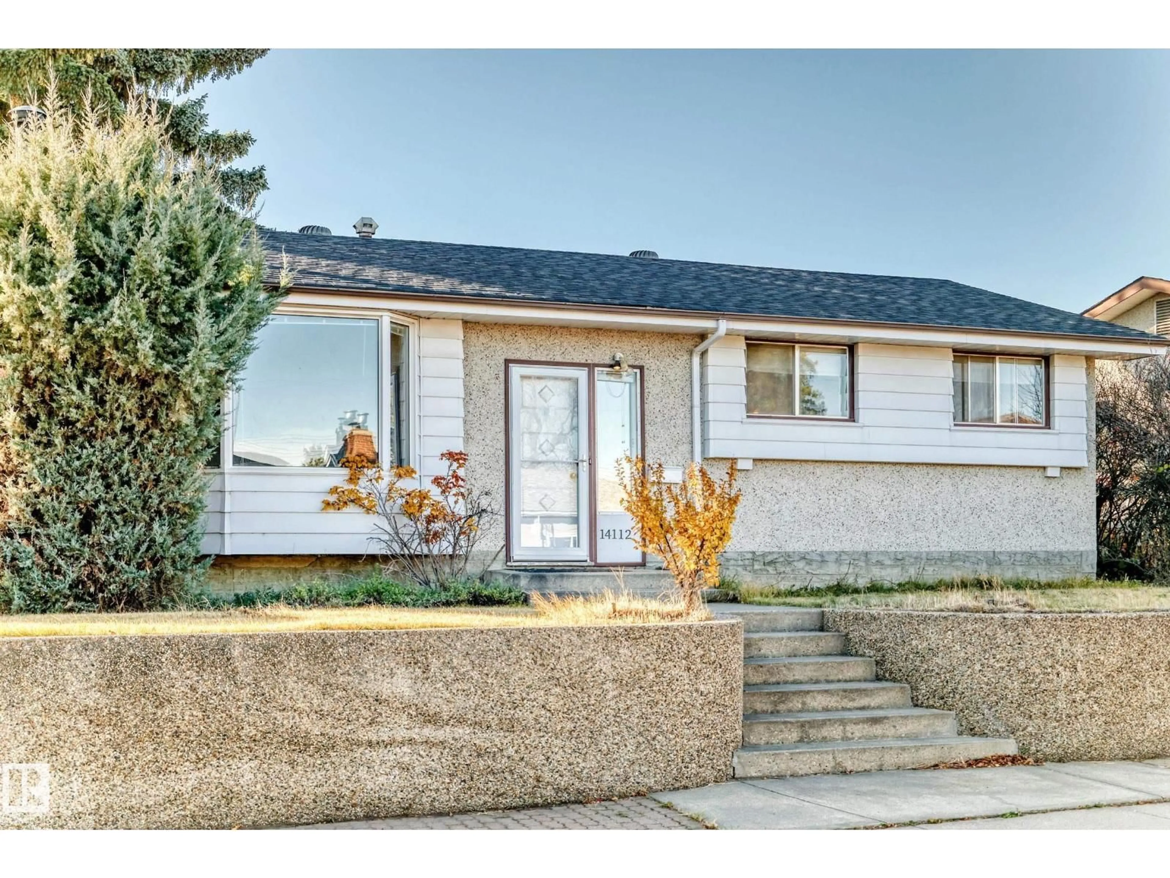 Home with vinyl exterior material, street for 14112 59 ST, Edmonton Alberta T5A1P1