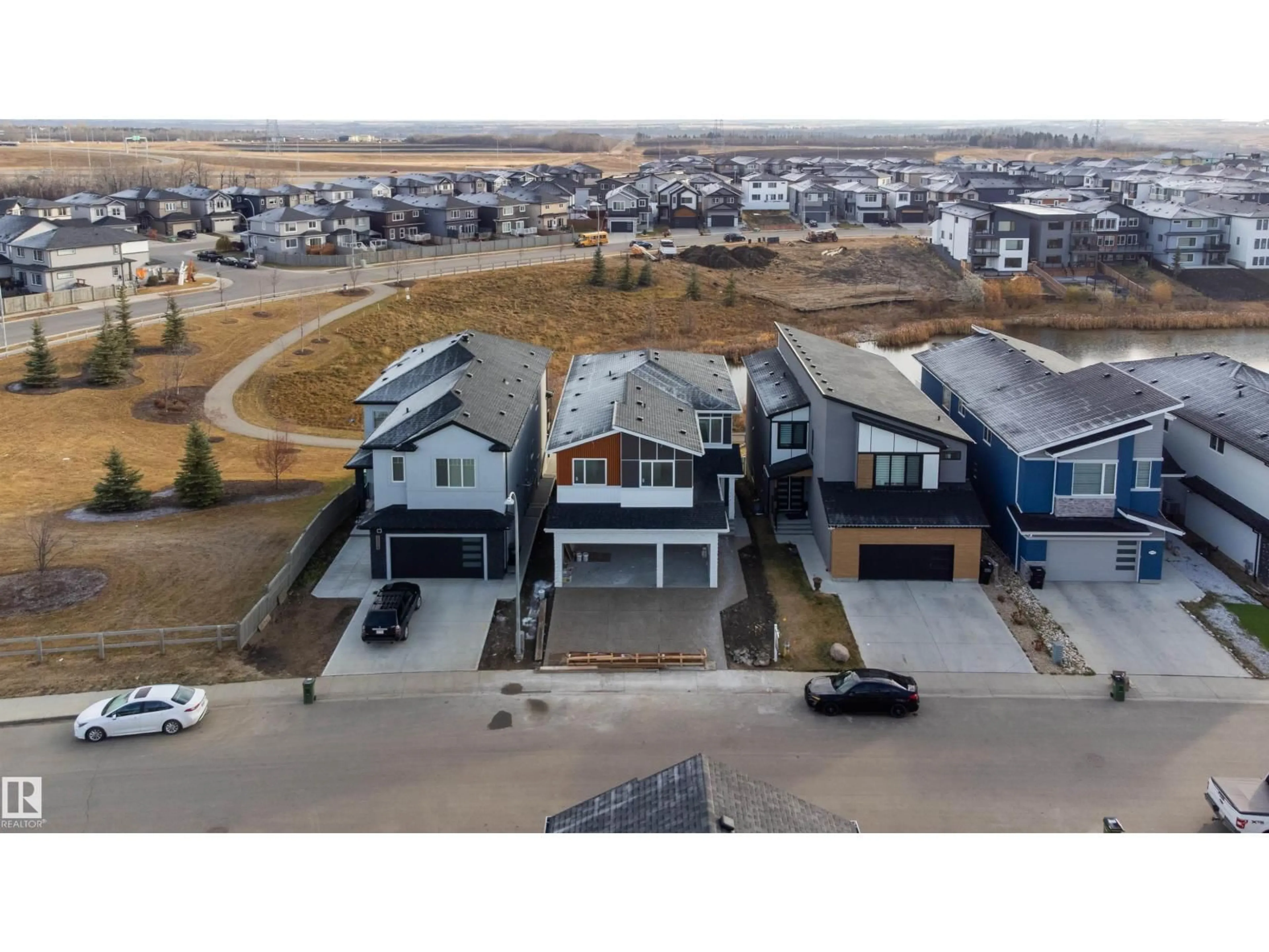 A pic from outside/outdoor area/front of a property/back of a property/a pic from drone, unknown for NW - 15115 14 ST, Edmonton Alberta T5Y3R5