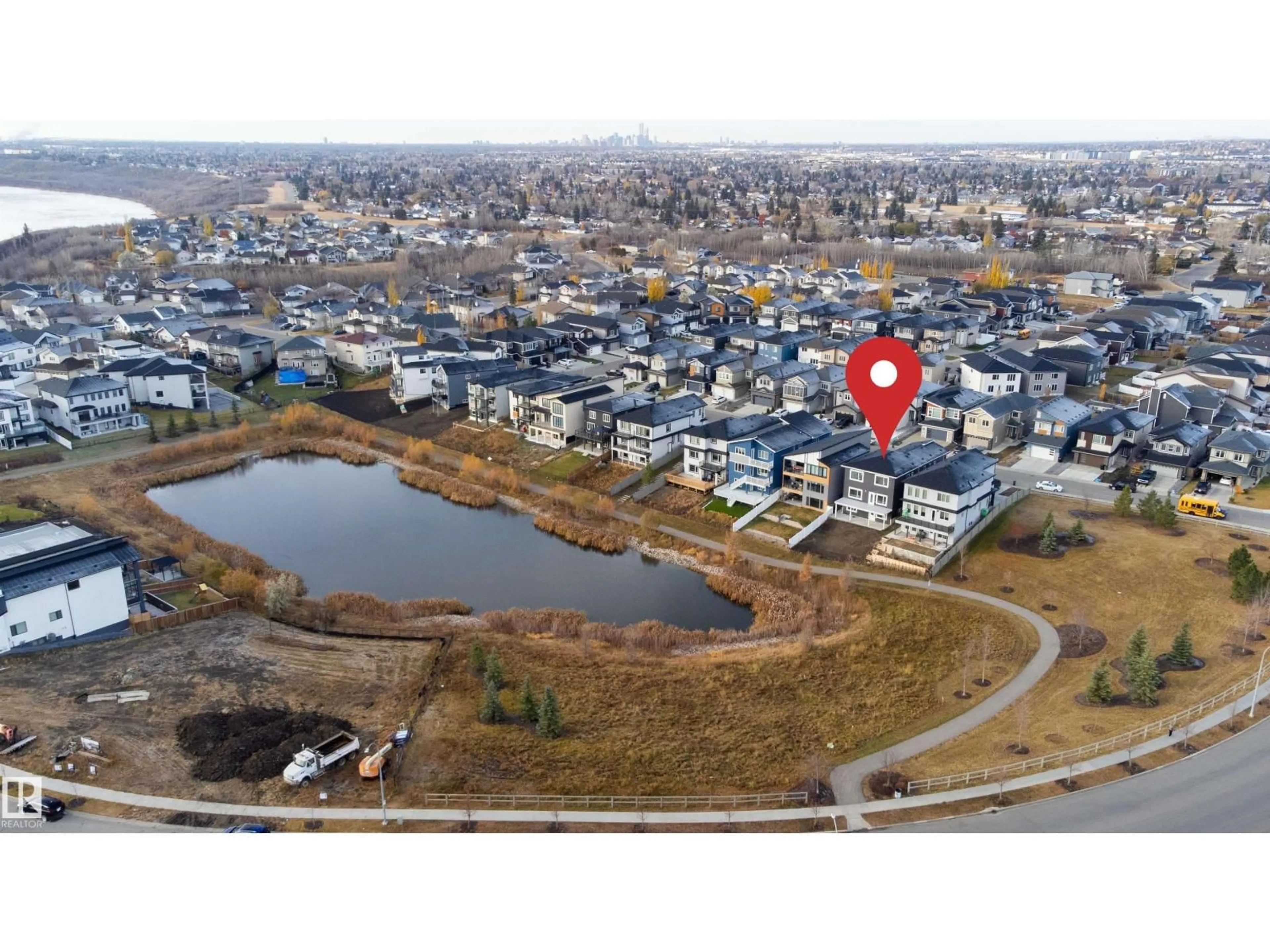 A pic from outside/outdoor area/front of a property/back of a property/a pic from drone, water/lake/river/ocean view for NW - 15115 14 ST, Edmonton Alberta T5Y3R5