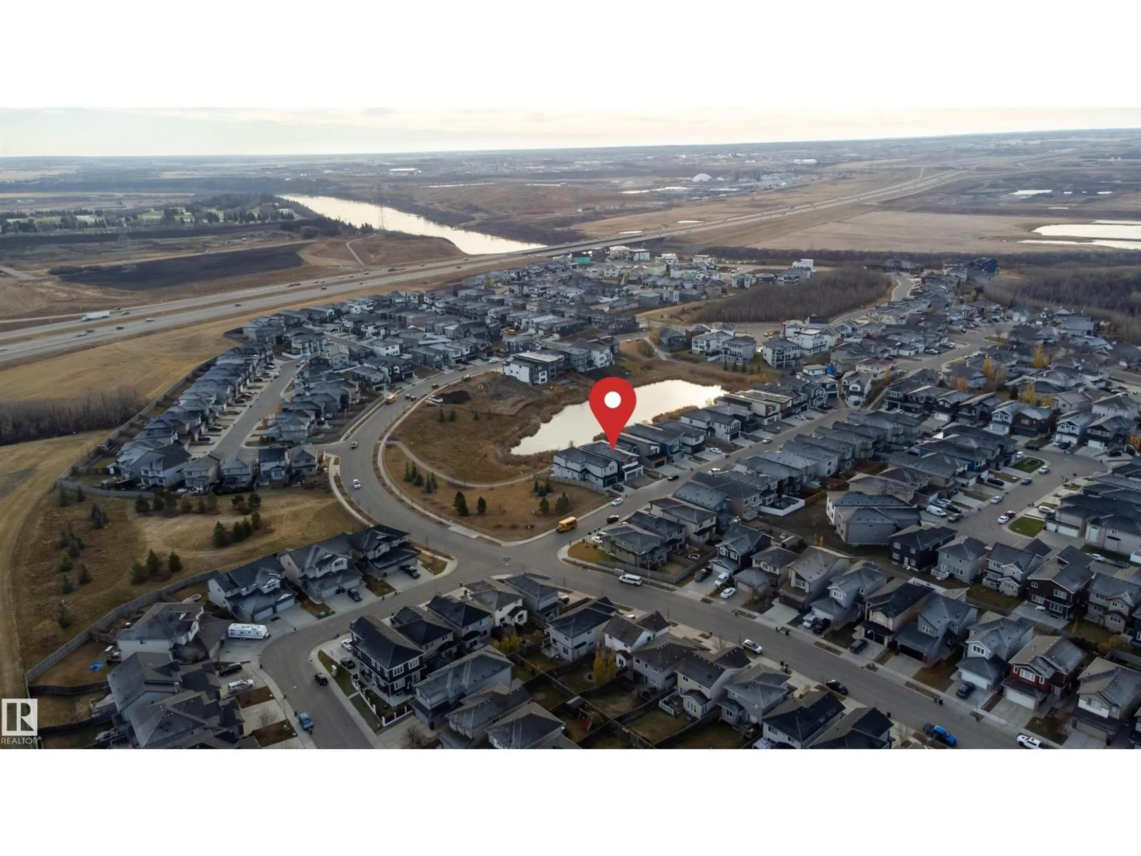 A pic from outside/outdoor area/front of a property/back of a property/a pic from drone, mountain view for NW - 15115 14 ST, Edmonton Alberta T5Y3R5