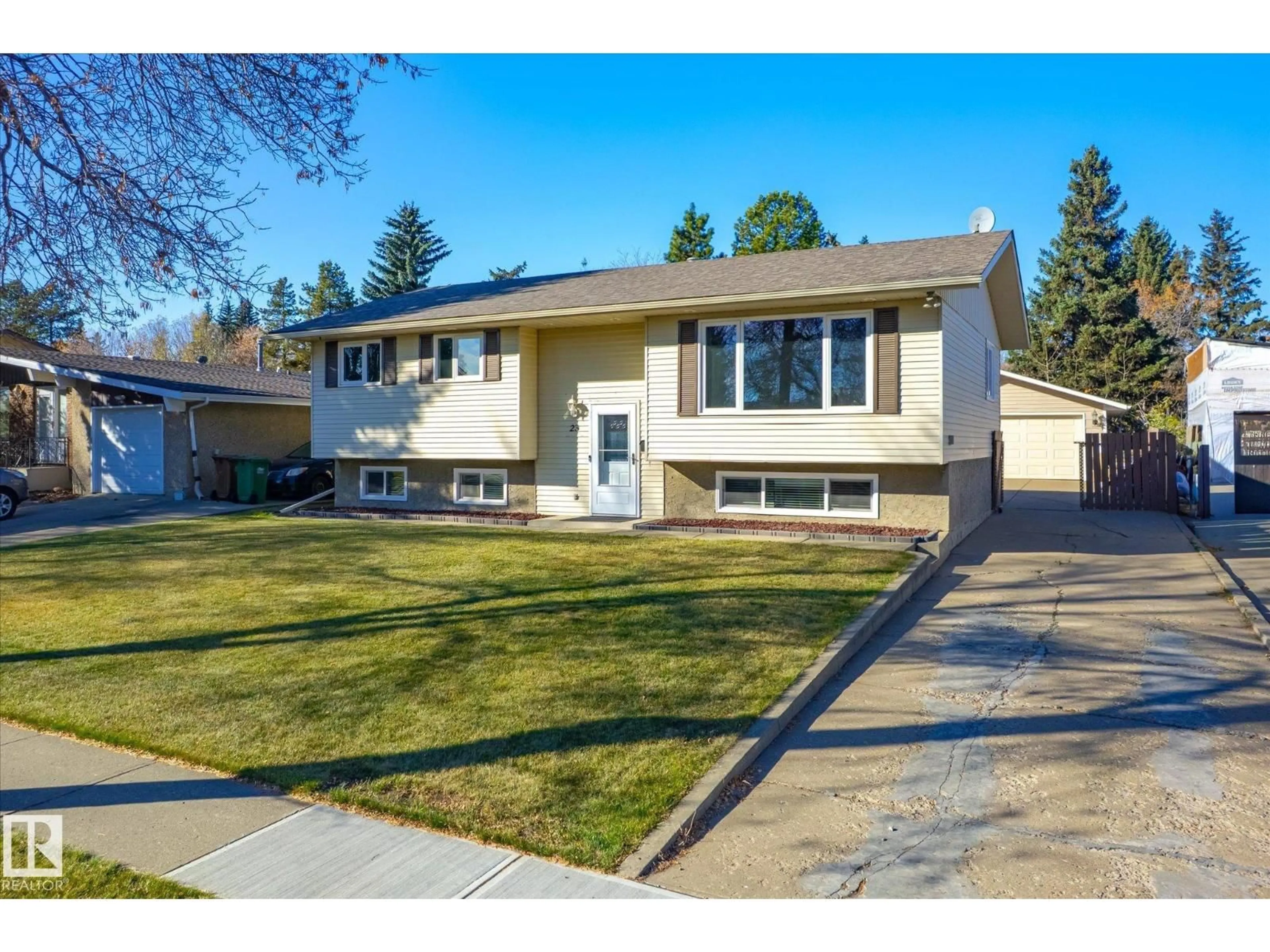 Home with vinyl exterior material, street for 23 ANNETTE CR, St. Albert Alberta T8N2Z8