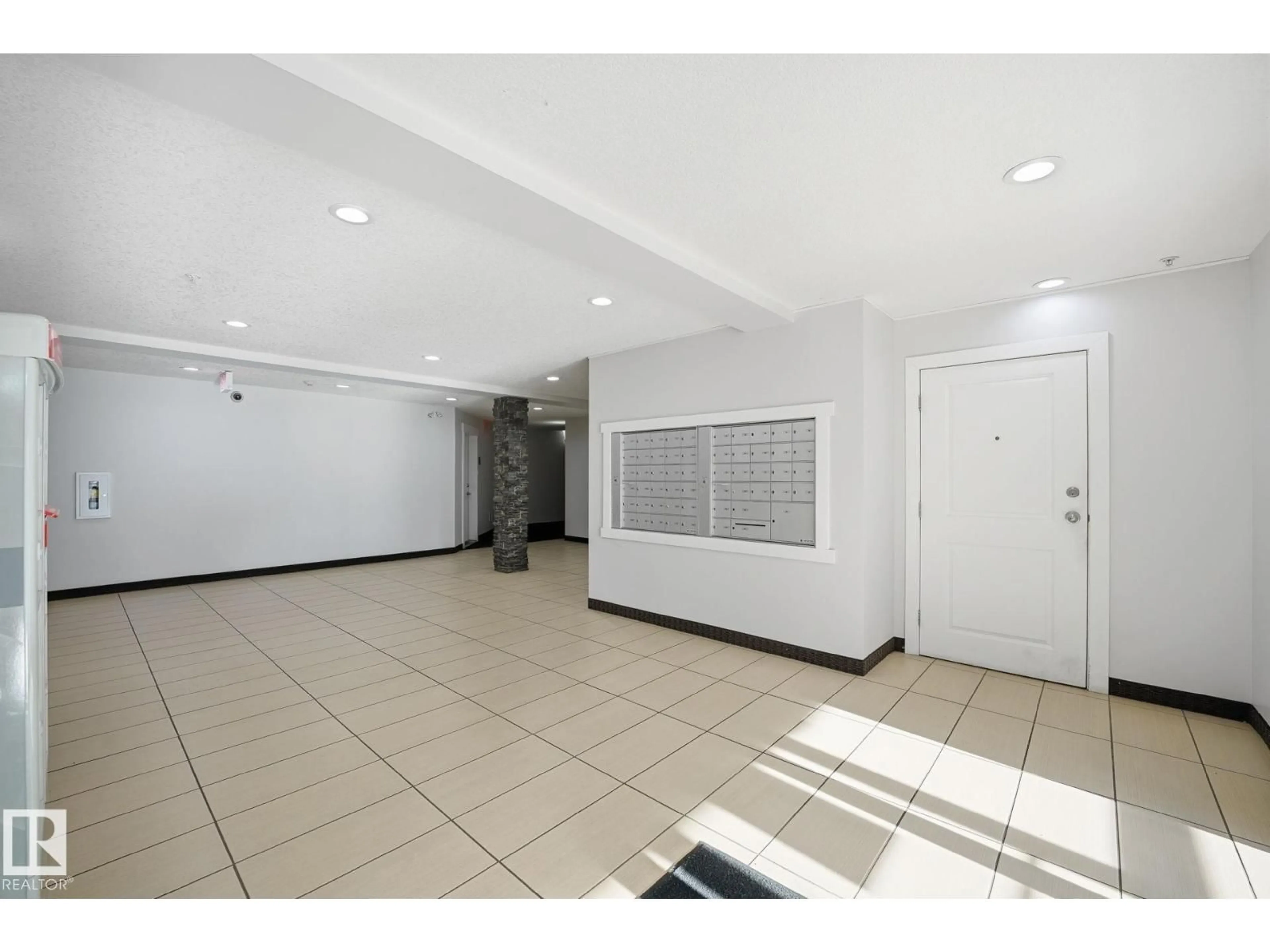 Indoor foyer for #311 - 9523 160 AV, Edmonton Alberta T5Z0M4