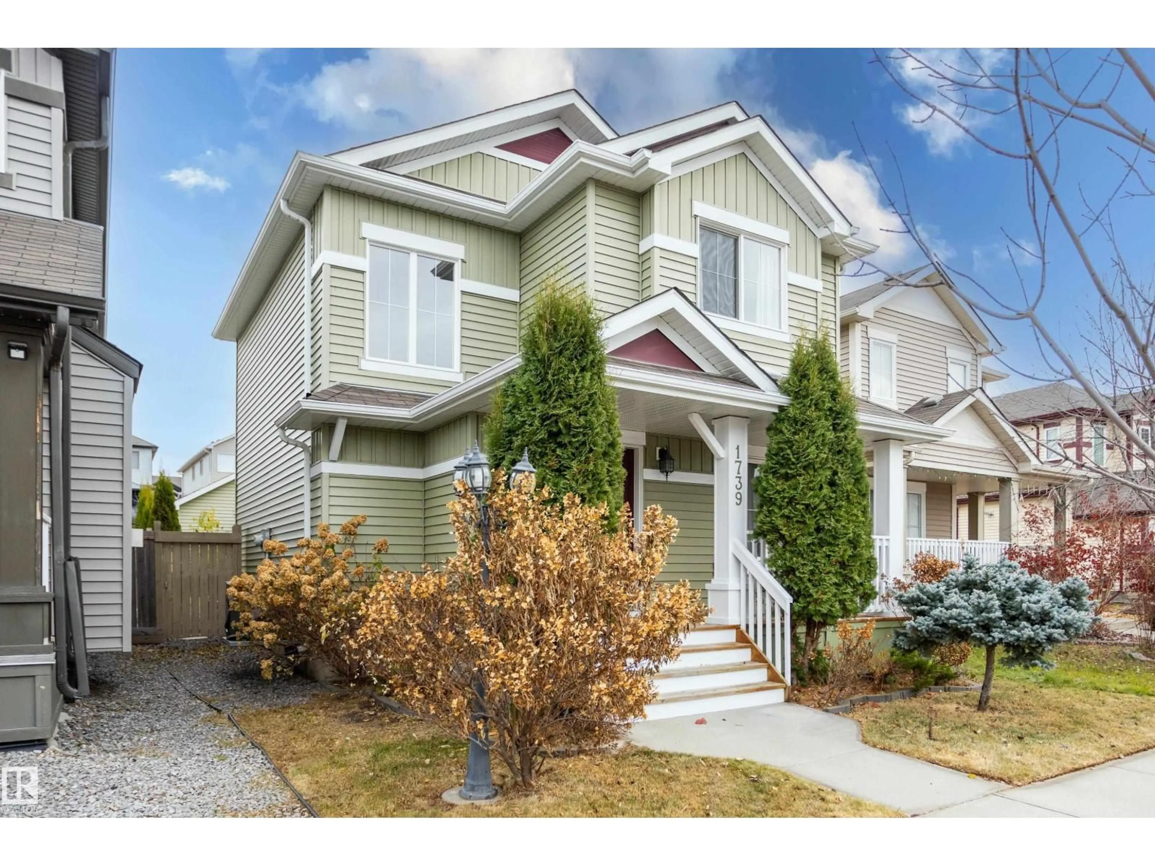 Home with vinyl exterior material, street for SW - 1739 56 ST, Edmonton Alberta T6X1P8