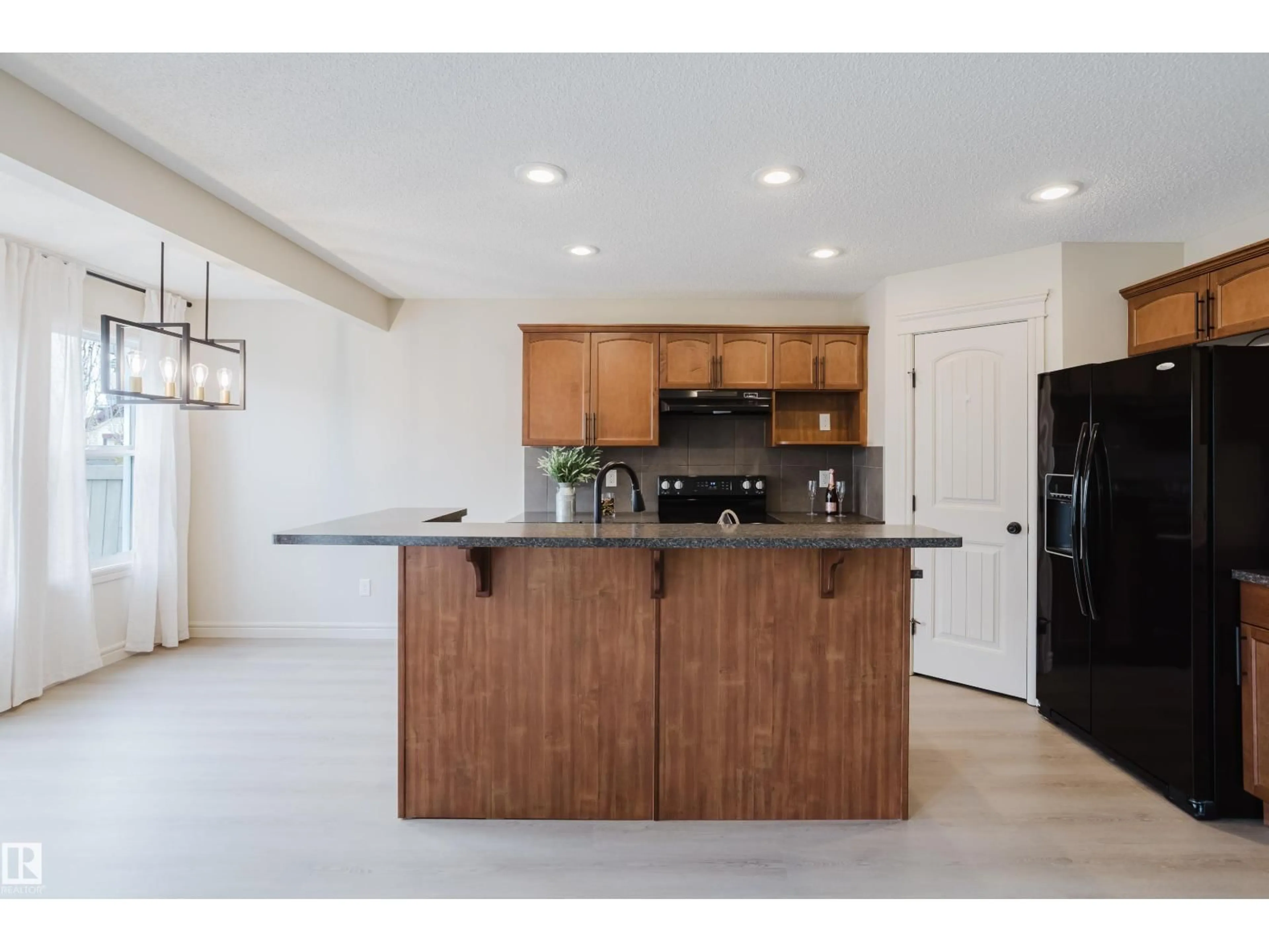 Open concept kitchen, ceramic/tile floor for SW - 1739 56 ST, Edmonton Alberta T6X1P8