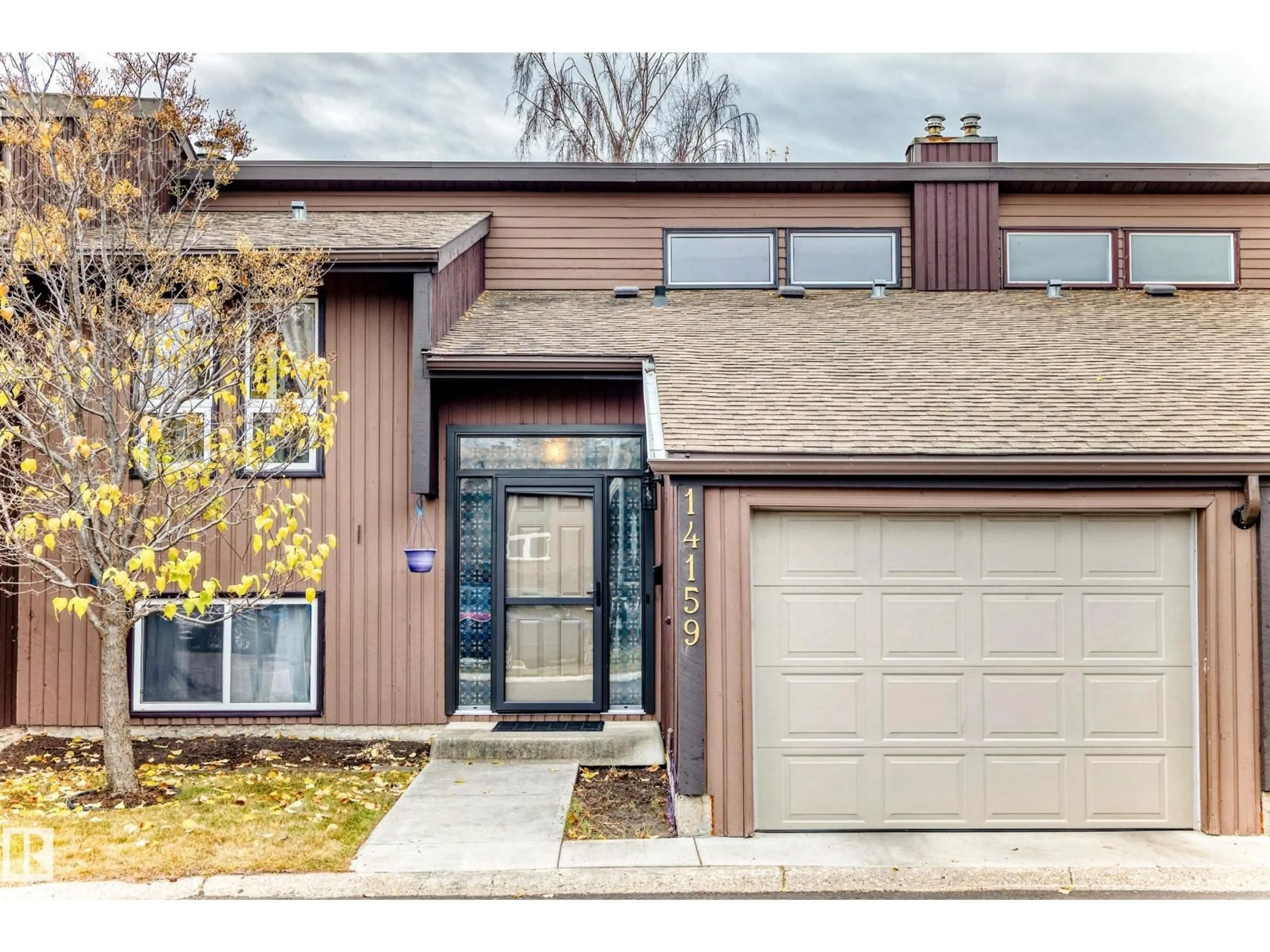 Home with brick exterior material, street for 14159 26 ST, Edmonton Alberta T5Y1S2