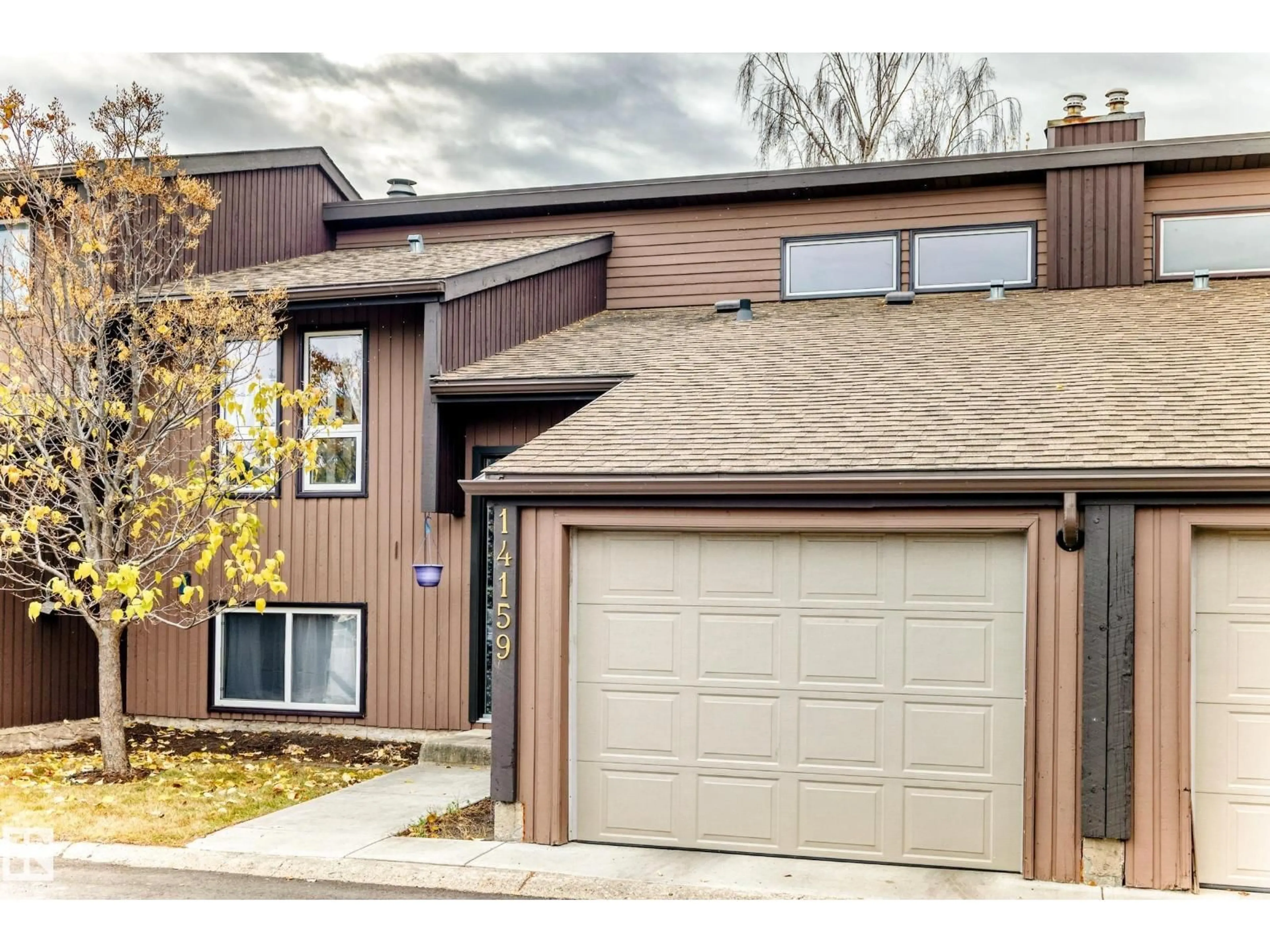 Home with brick exterior material, street for 14159 26 ST, Edmonton Alberta T5Y1S2