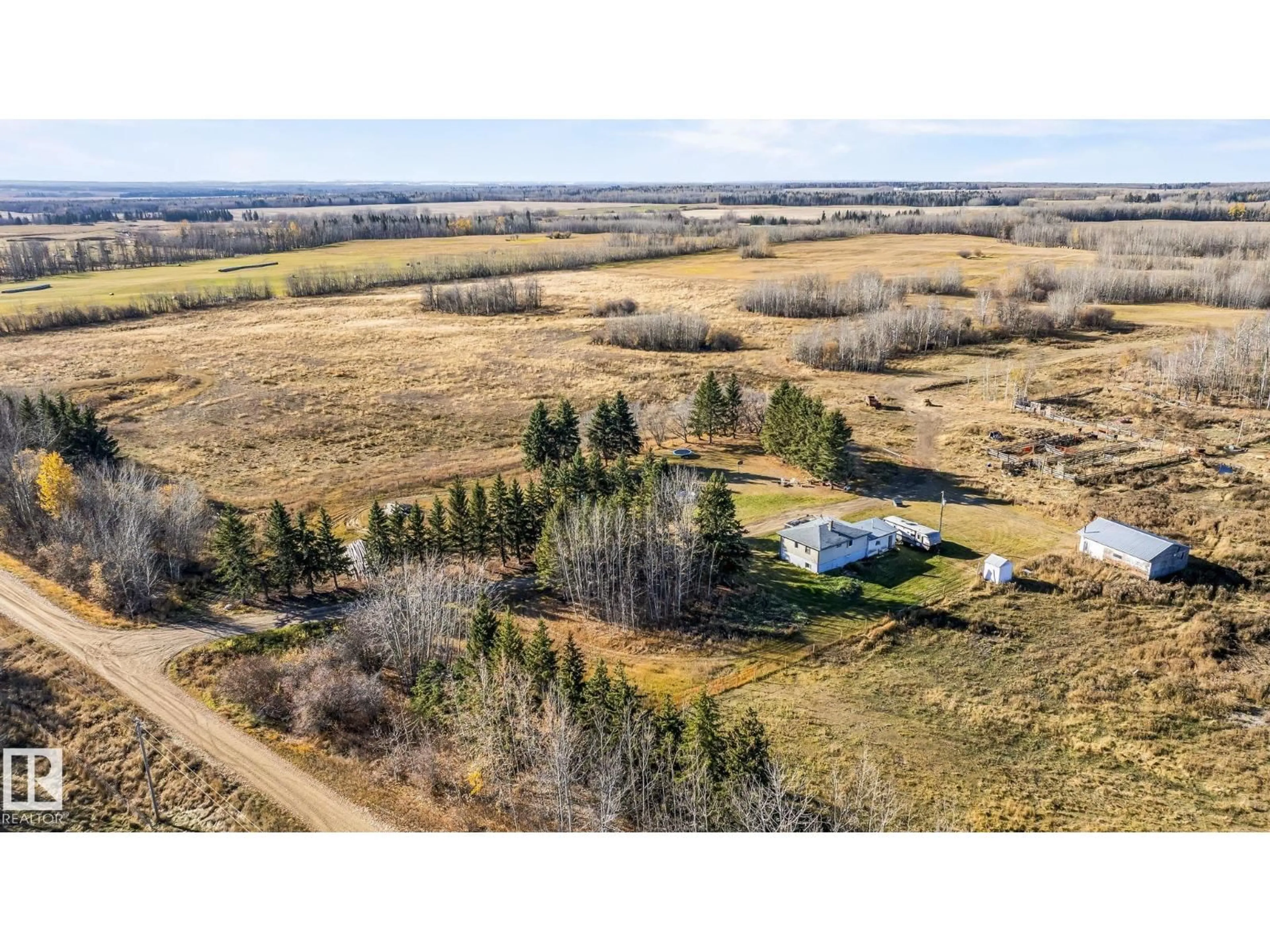 A pic from outside/outdoor area/front of a property/back of a property/a pic from drone, unknown for 62424 RGE ROAD 255, Rural Westlock County Alberta T0G0S0