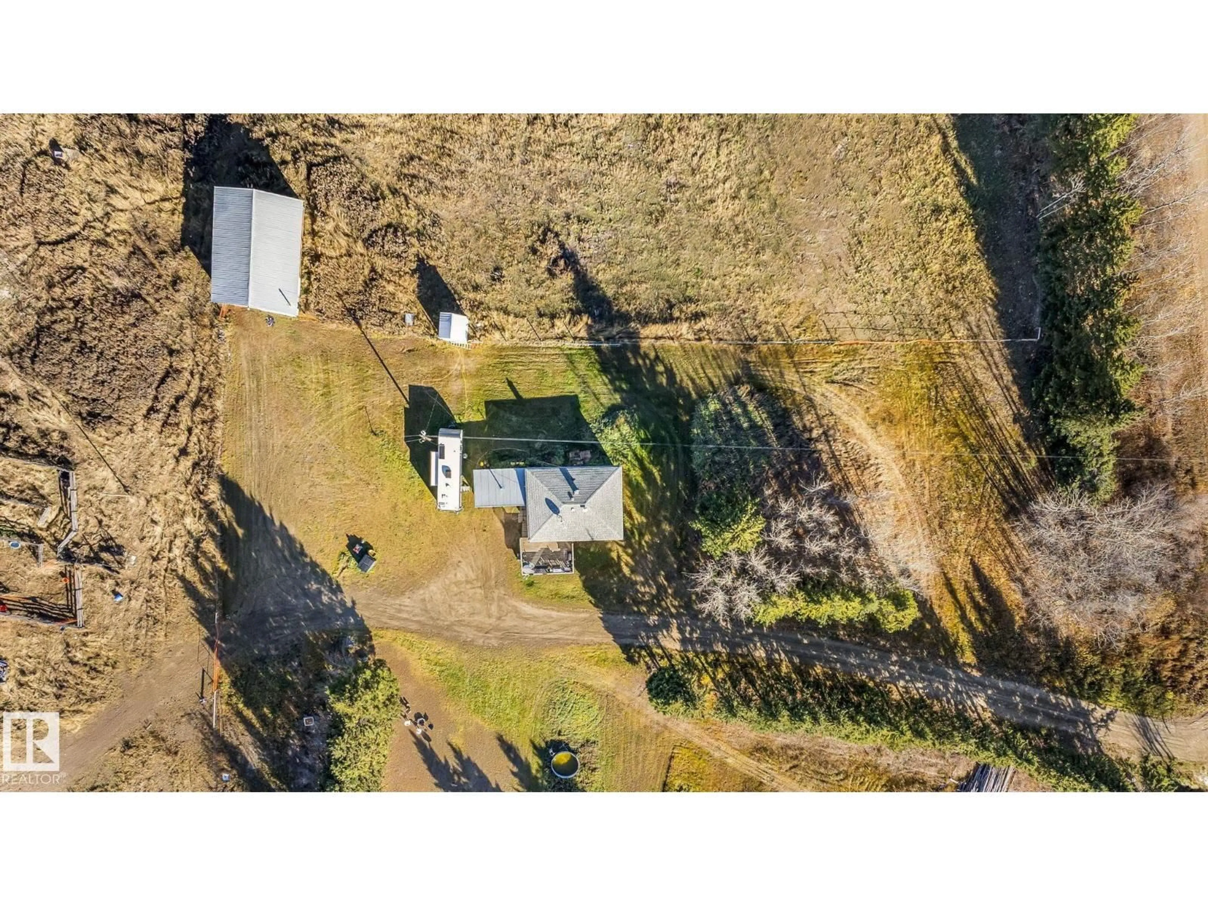 A pic from outside/outdoor area/front of a property/back of a property/a pic from drone, unknown for 62424 RGE ROAD 255, Rural Westlock County Alberta T0G0S0