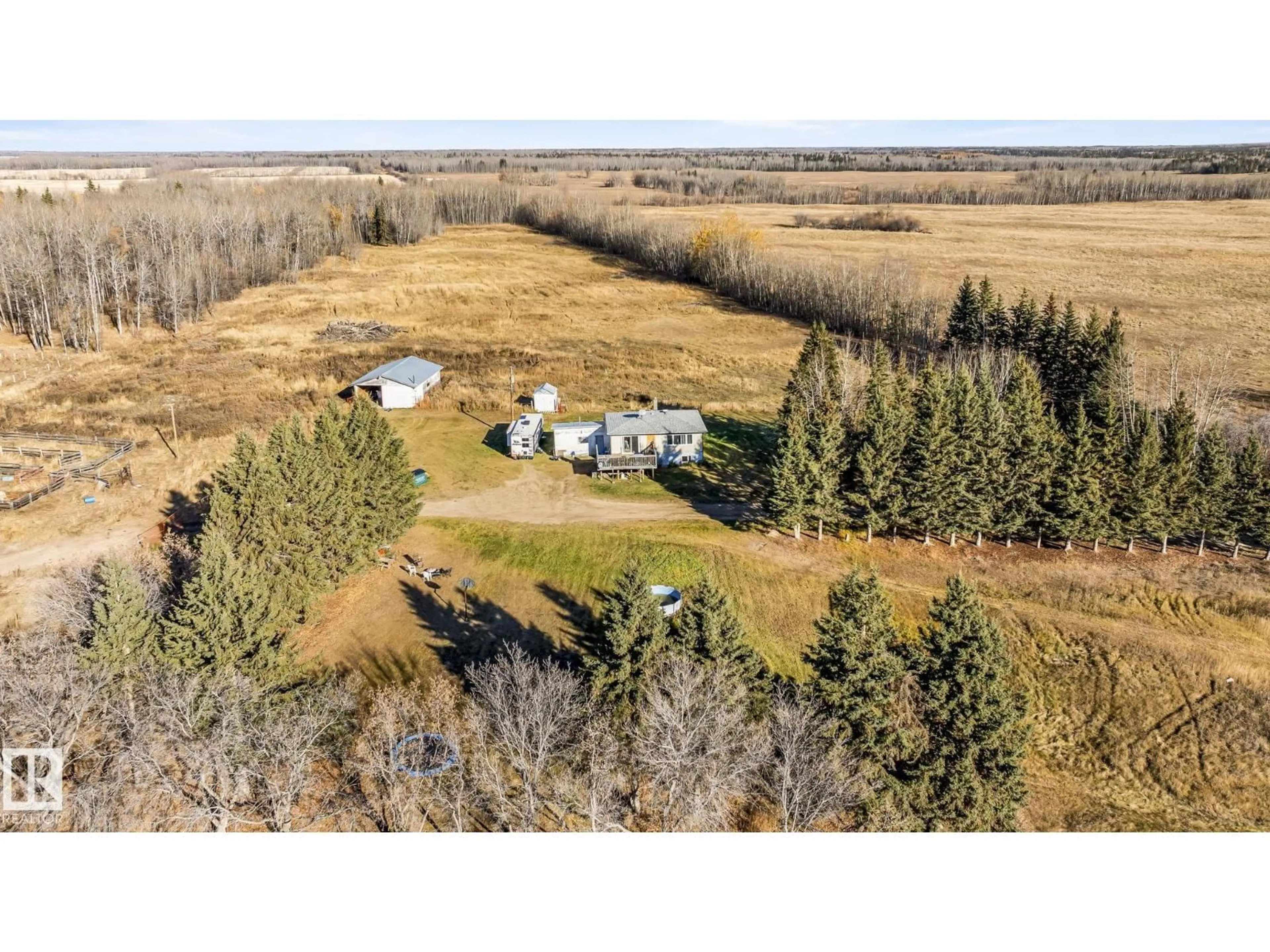 A pic from outside/outdoor area/front of a property/back of a property/a pic from drone, unknown for 62424 RGE ROAD 255, Rural Westlock County Alberta T0G0S0