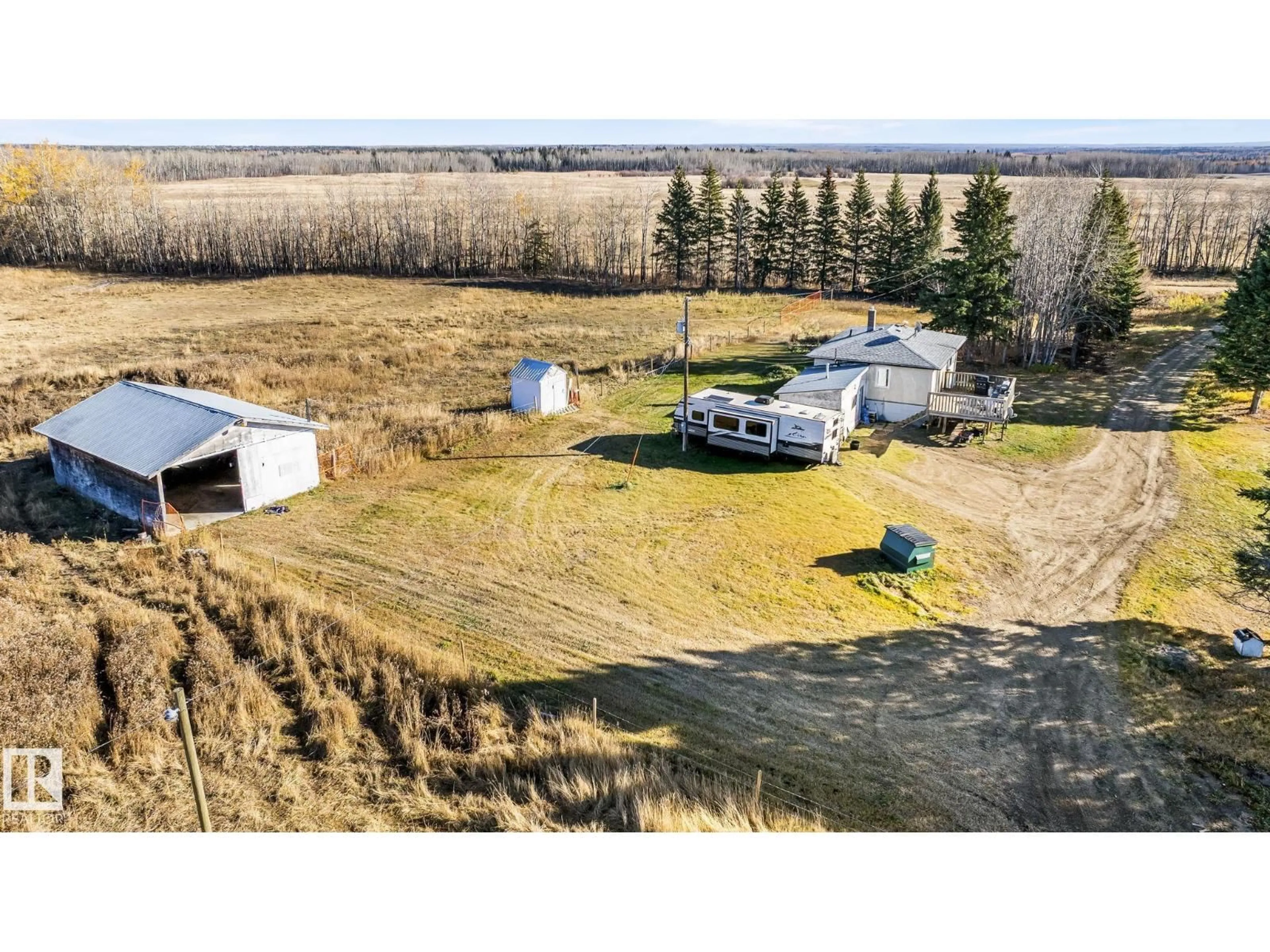 A pic from outside/outdoor area/front of a property/back of a property/a pic from drone, unknown for 62424 RGE ROAD 255, Rural Westlock County Alberta T0G0S0