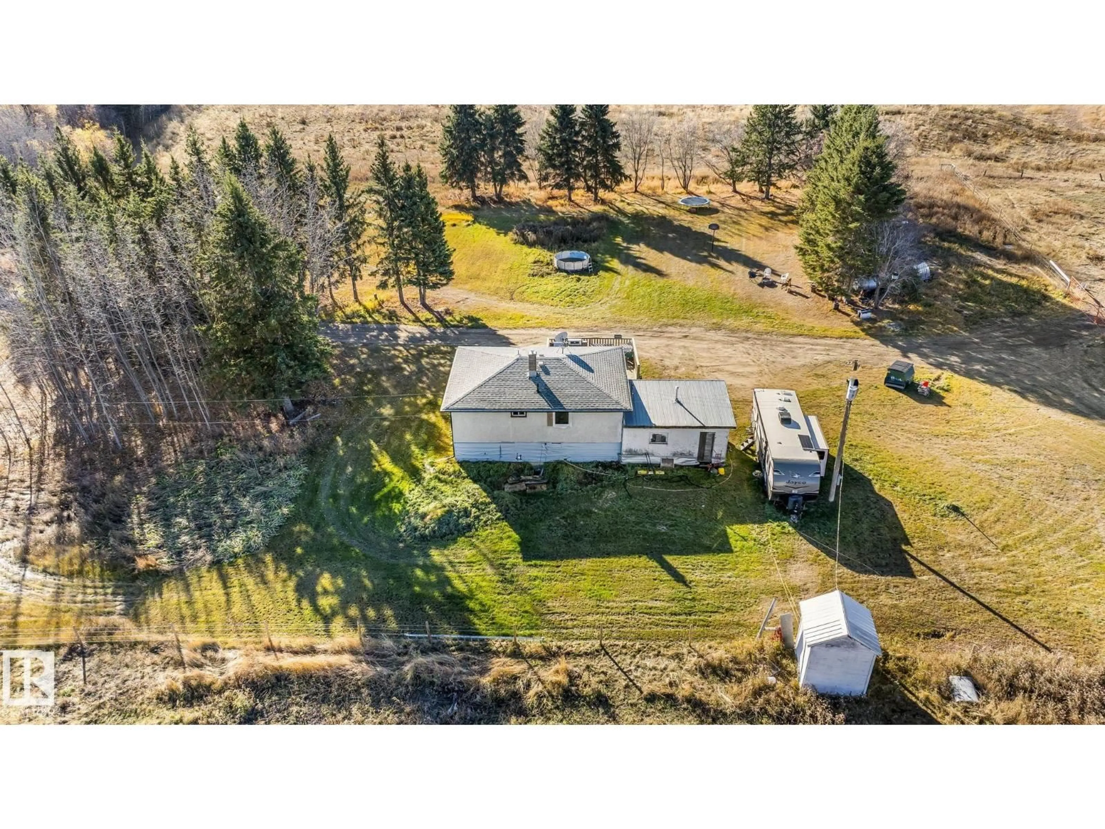 A pic from outside/outdoor area/front of a property/back of a property/a pic from drone, unknown for 62424 RGE ROAD 255, Rural Westlock County Alberta T0G0S0