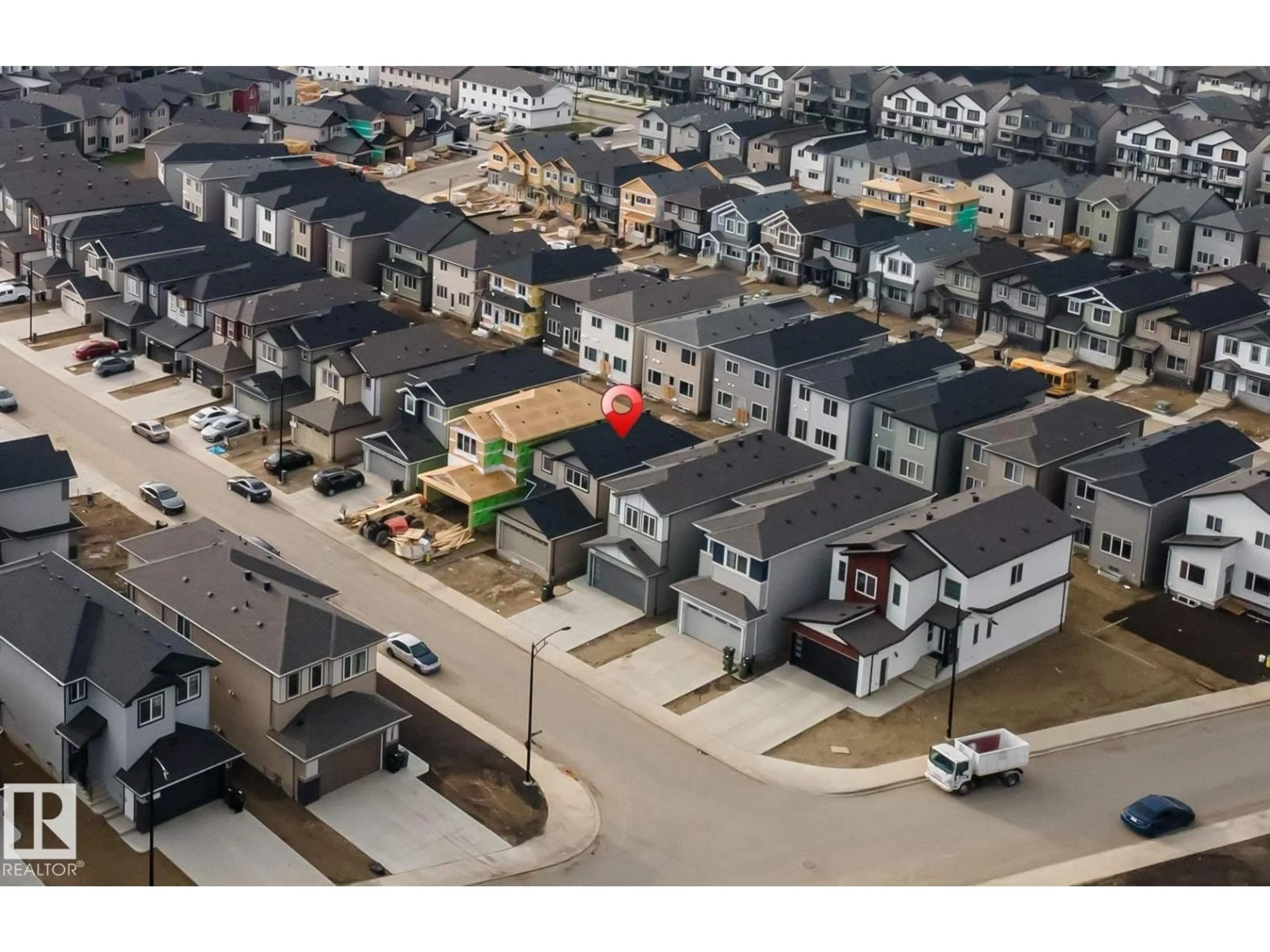 A pic from outside/outdoor area/front of a property/back of a property/a pic from drone, street for 1216 13 AV, Edmonton Alberta T6T2W2