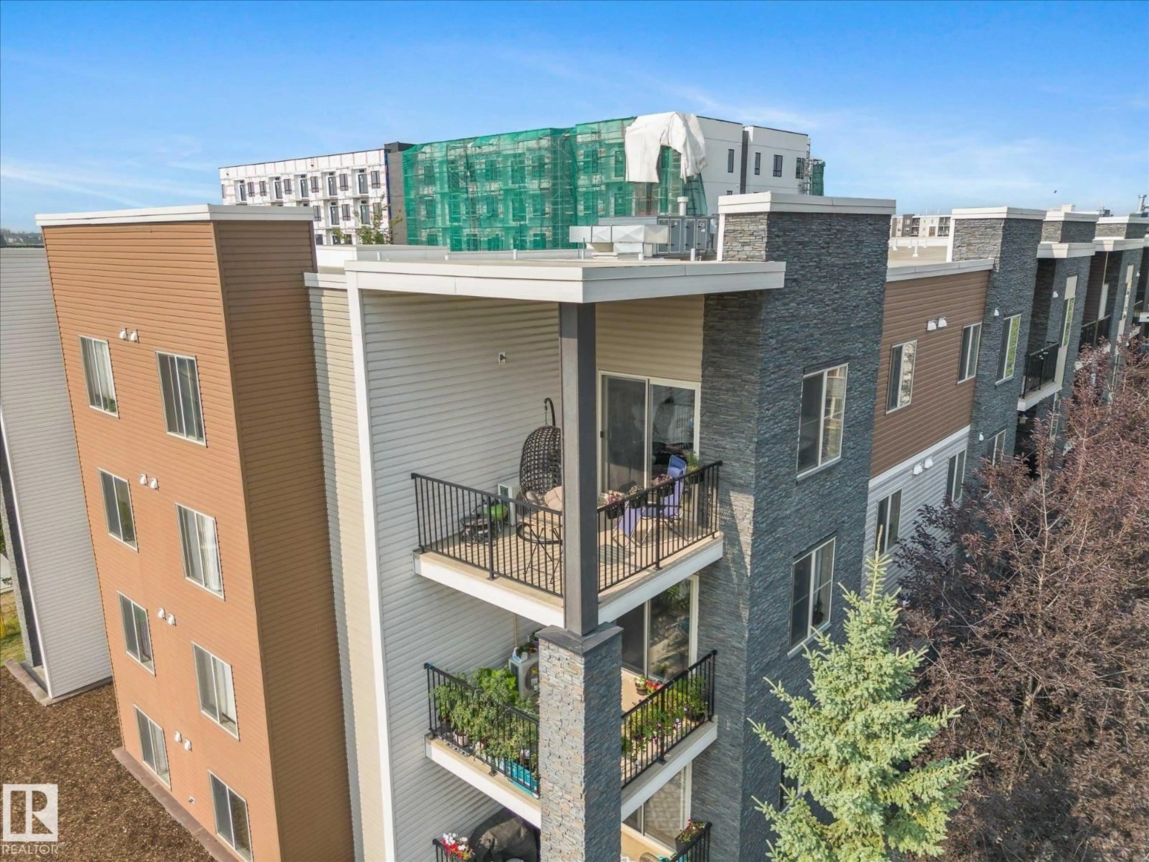 A pic from outside/outdoor area/front of a property/back of a property/a pic from drone, city buildings view from balcony for 402 - 11803 22 AV SW, Edmonton Alberta T6W2R9