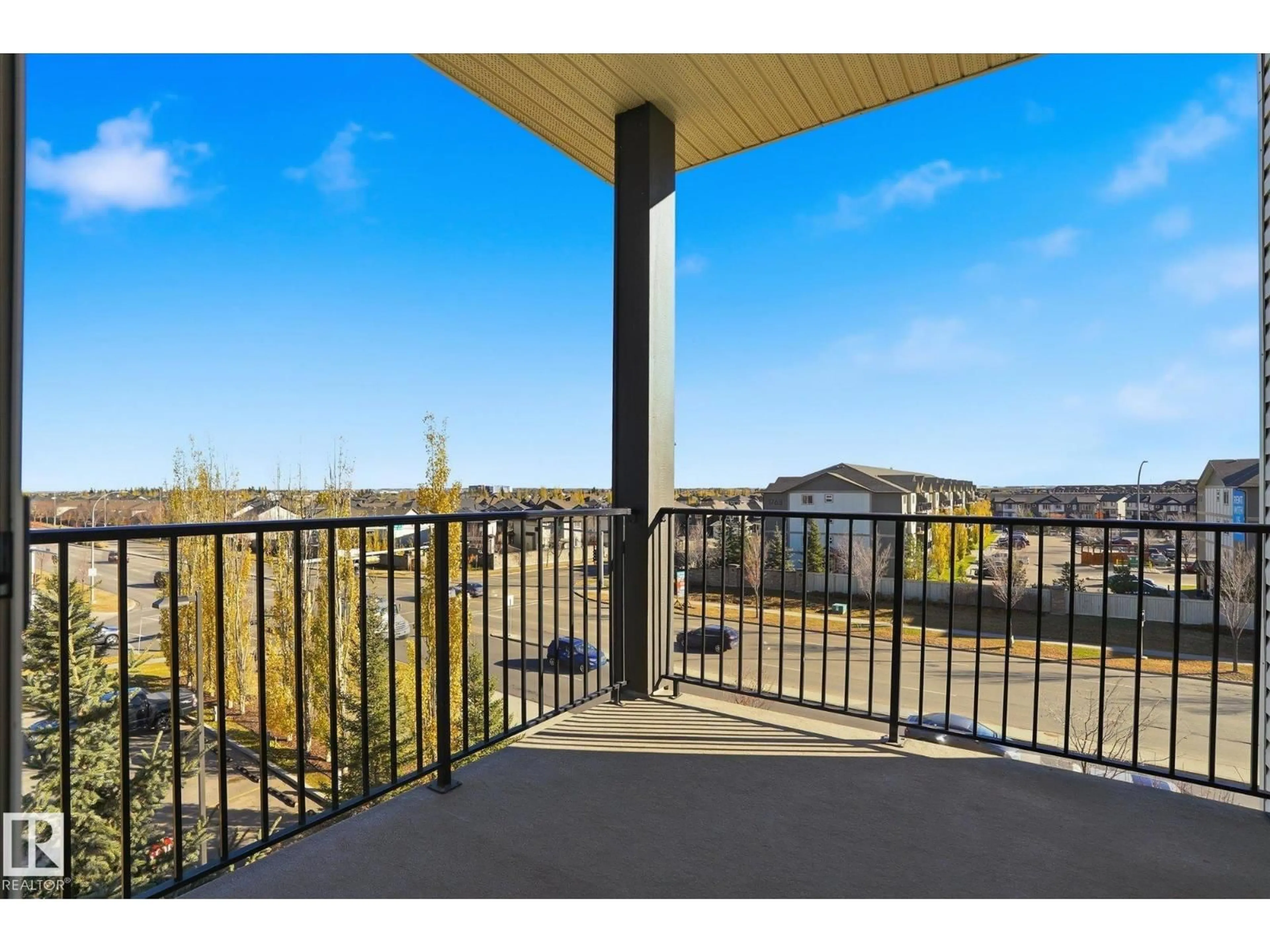Patio, water/lake/river/ocean view for 402 - 11803 22 AV SW, Edmonton Alberta T6W2R9