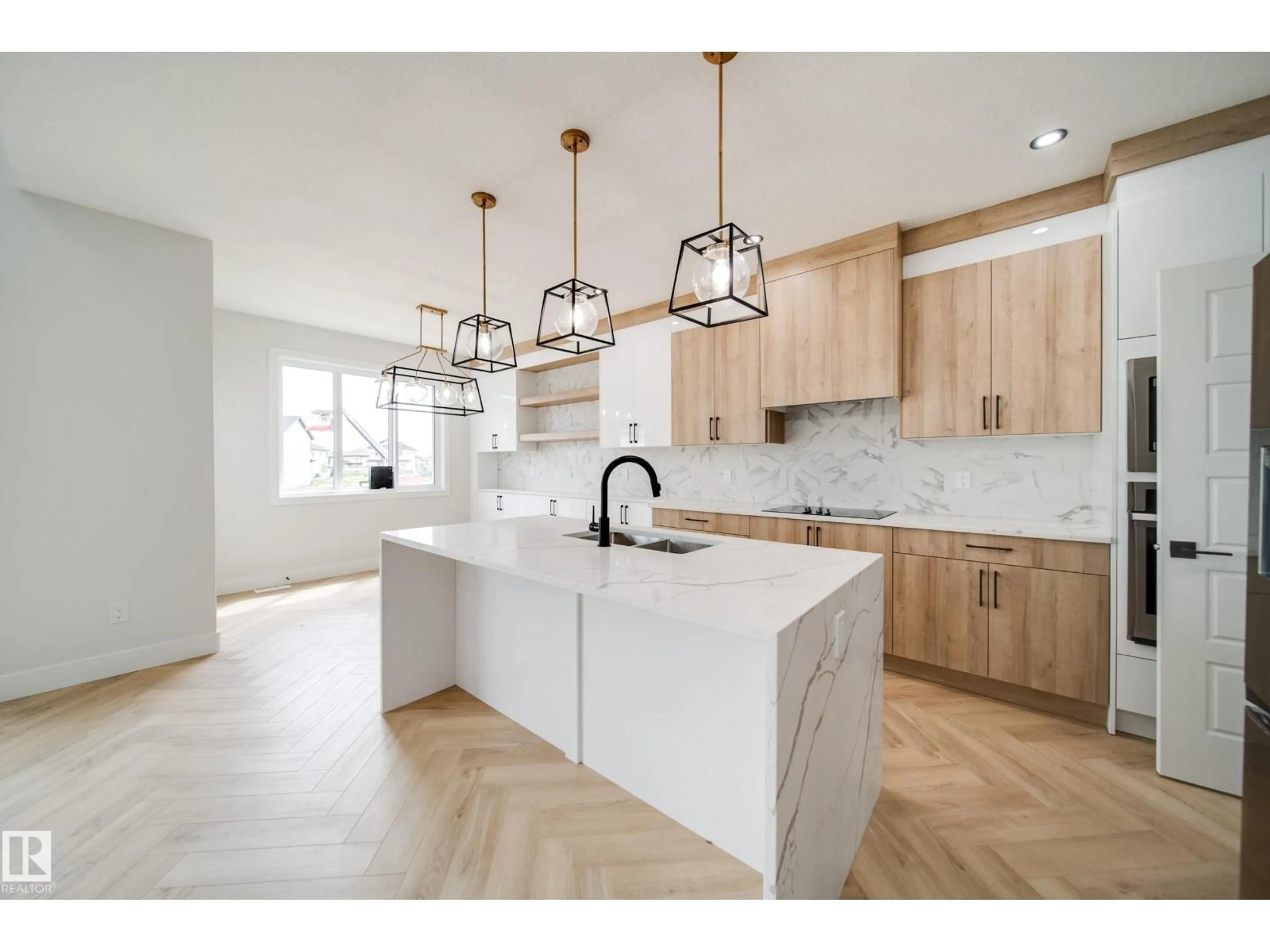 Open concept kitchen, ceramic/tile floor for 8815 183 AV, Edmonton Alberta T5Z0S8