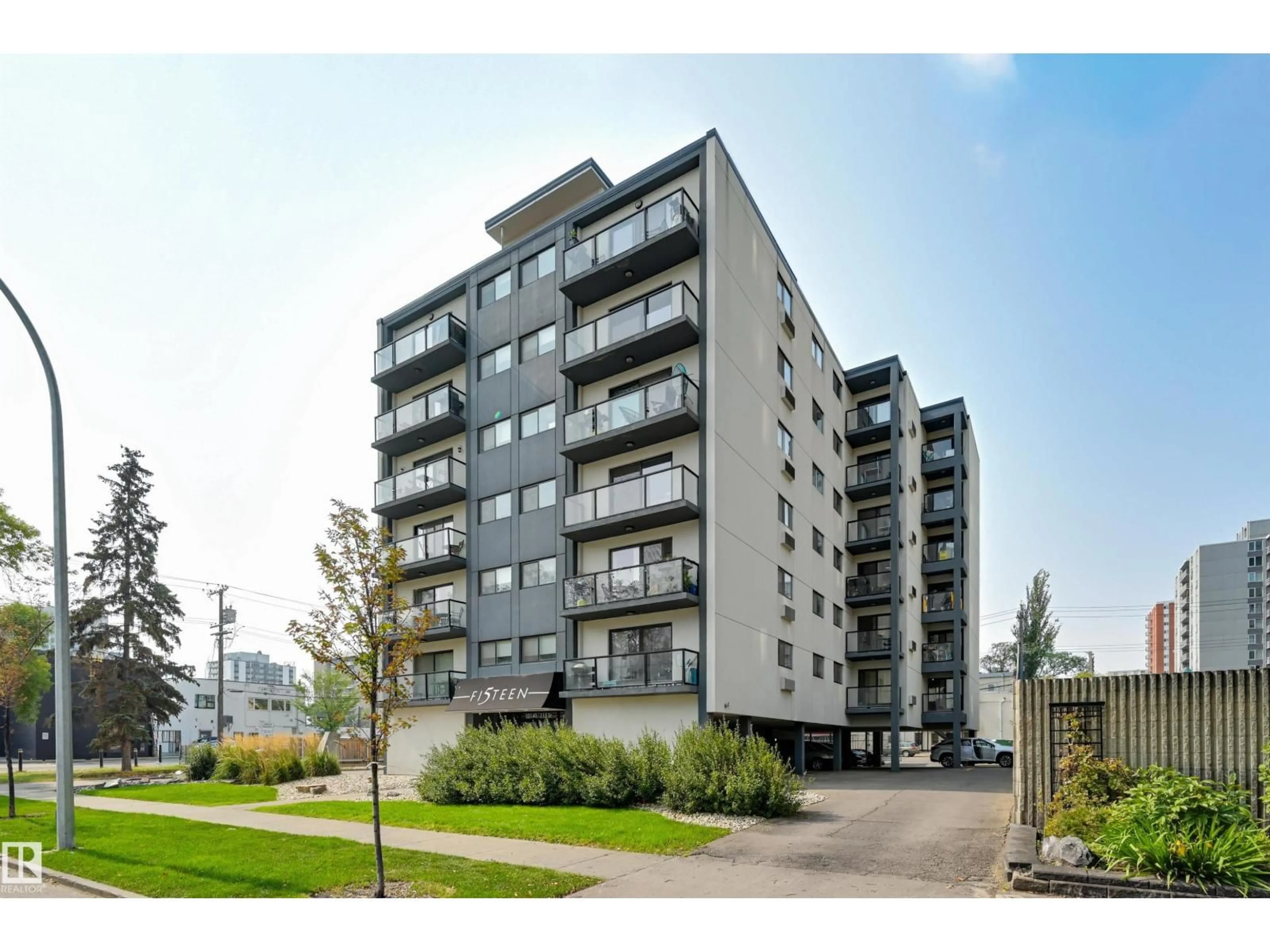 A pic from outside/outdoor area/front of a property/back of a property/a pic from drone, street for #104 - 10140 115 ST NW, Edmonton Alberta T5K1T5