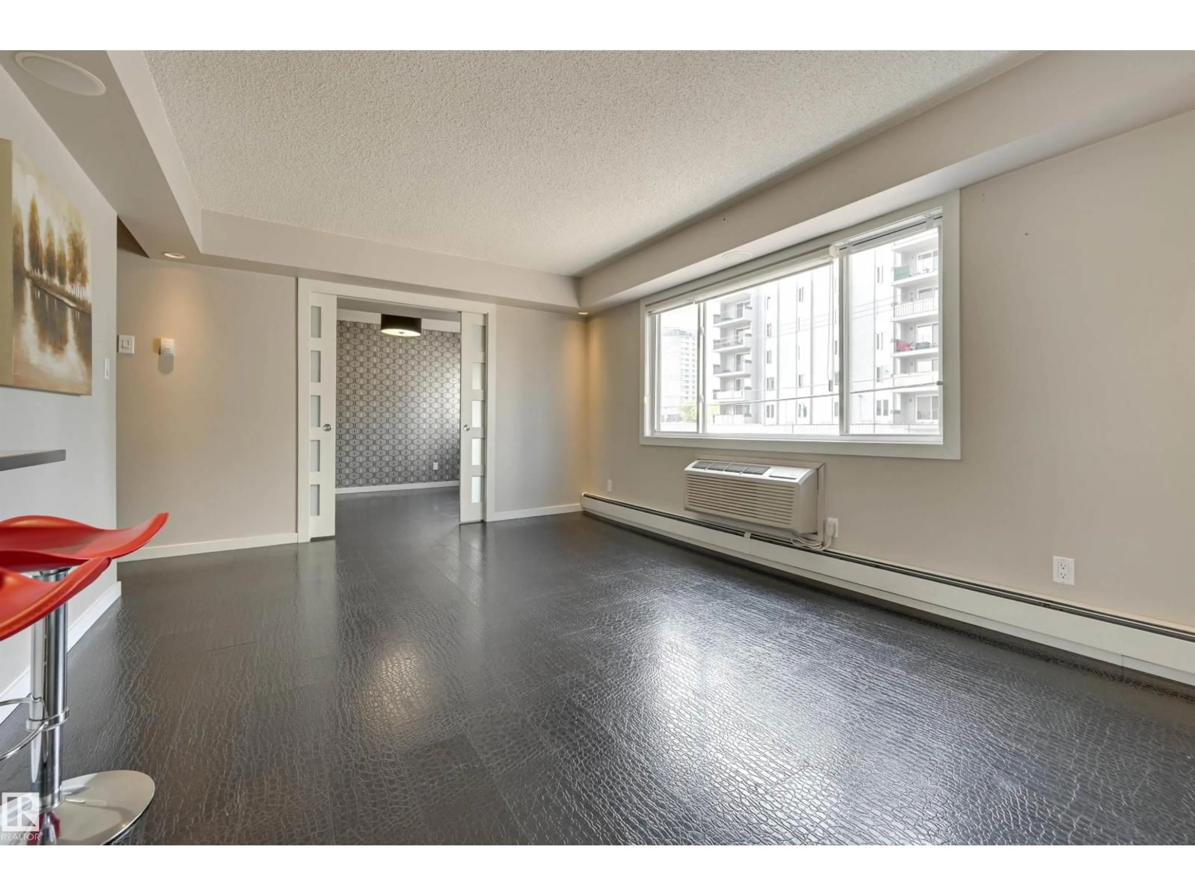 A pic of a room for #104 - 10140 115 ST NW, Edmonton Alberta T5K1T5