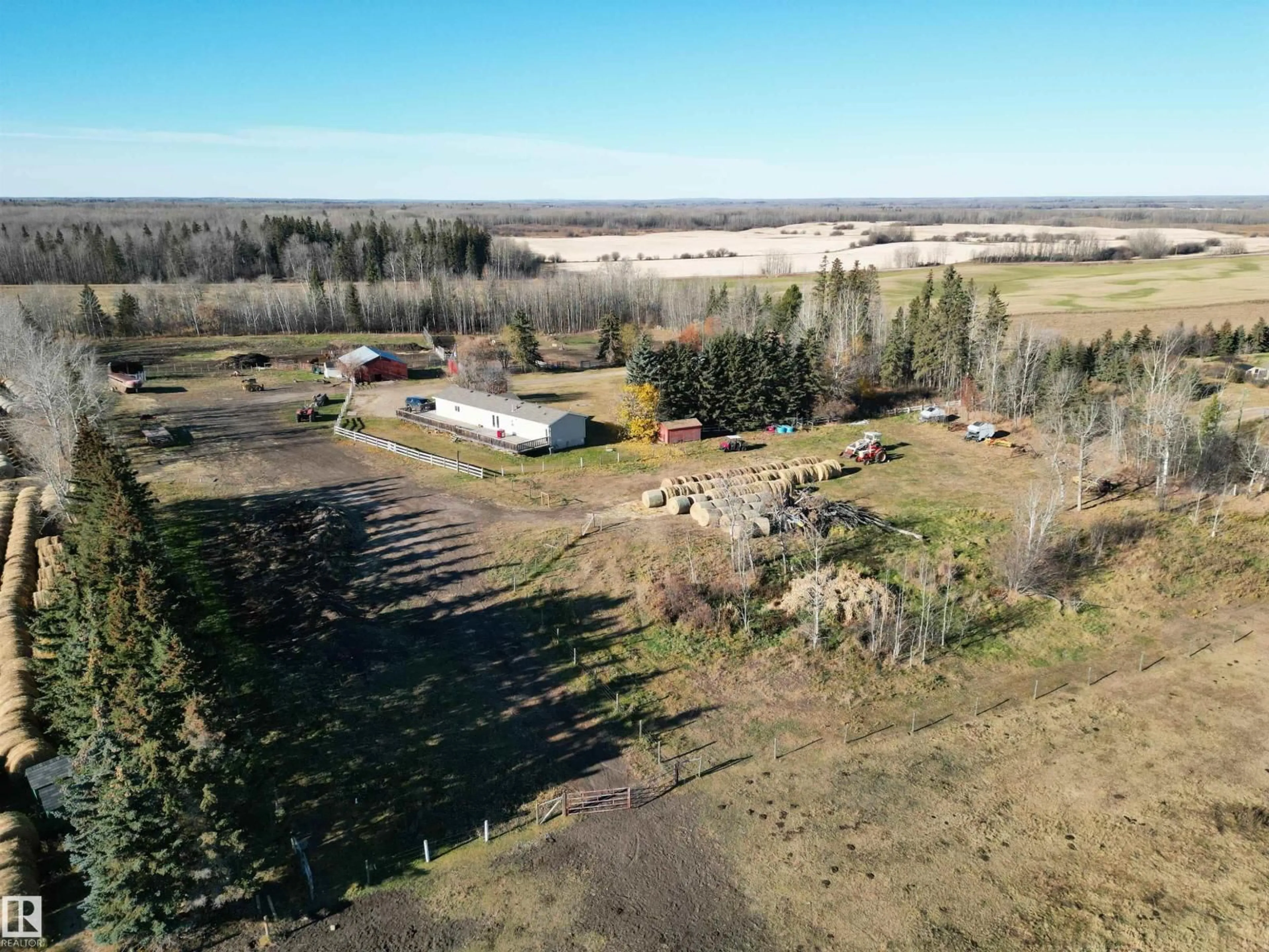 A pic from outside/outdoor area/front of a property/back of a property/a pic from drone, unknown for Comp 4 - 107 RANGE ROAD 1, Rural Lac Ste. Anne County Alberta T0E0A1