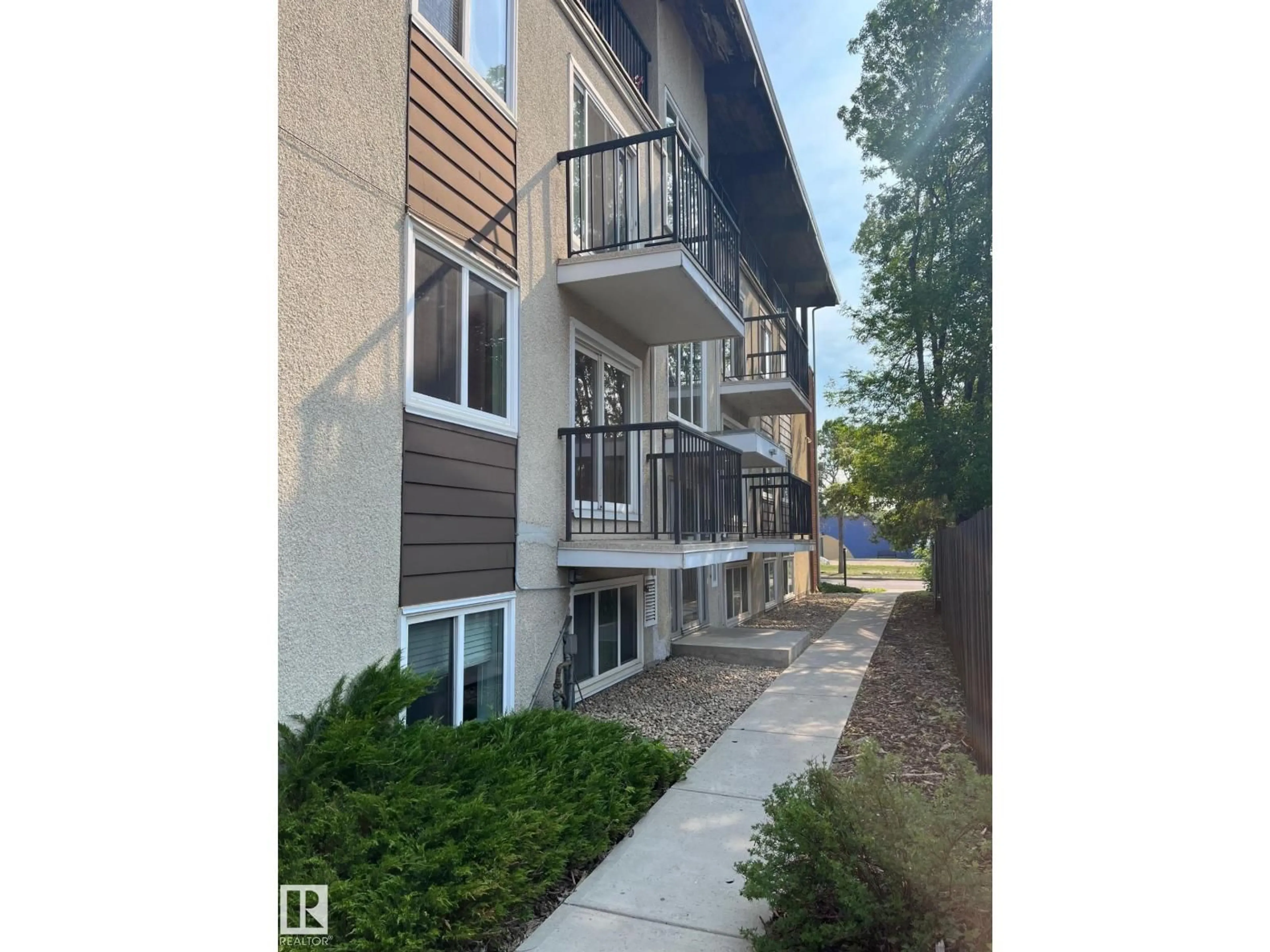 A pic from outside/outdoor area/front of a property/back of a property/a pic from drone, street for #203 - 8524 GATEWAY BV, Edmonton Alberta T6E4B5