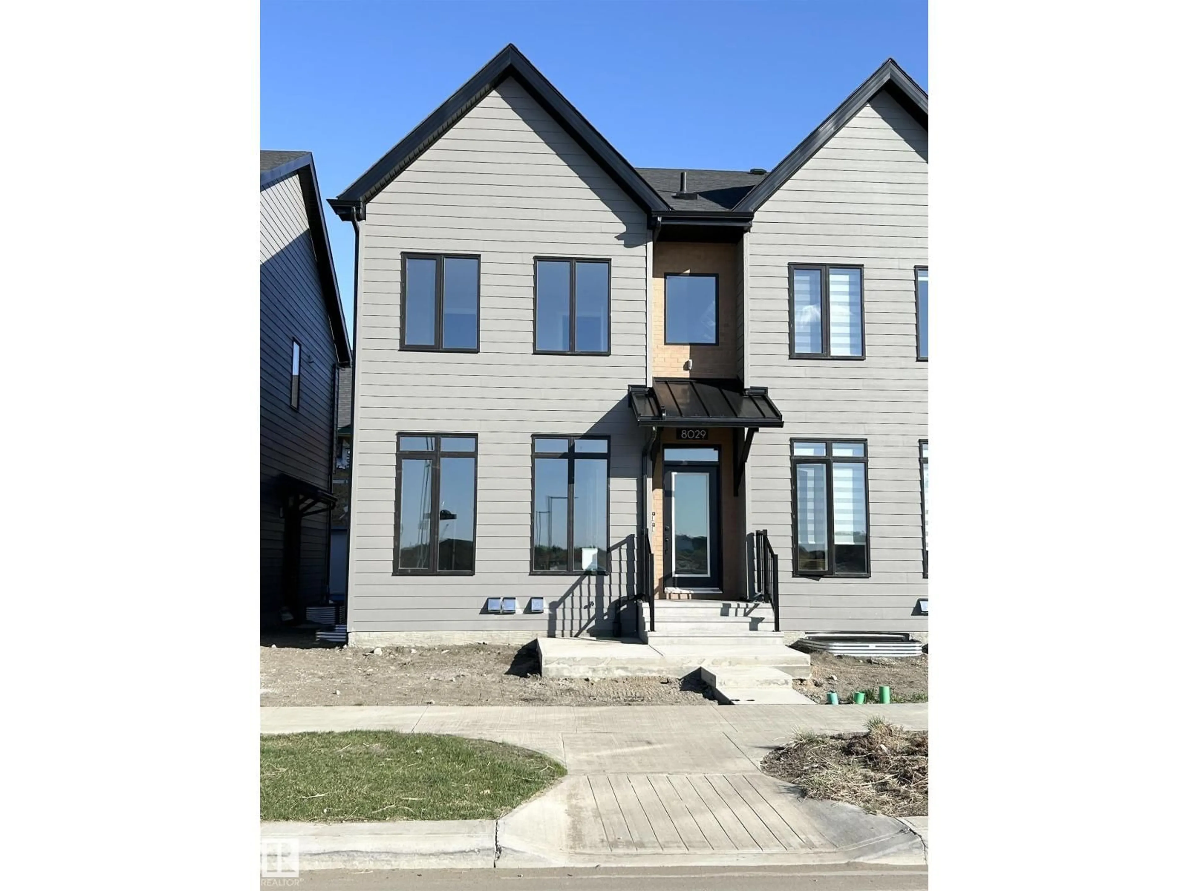 Home with brick exterior material, street for 8029 CEDRIC MAH RD, Edmonton Alberta T5G2Z5