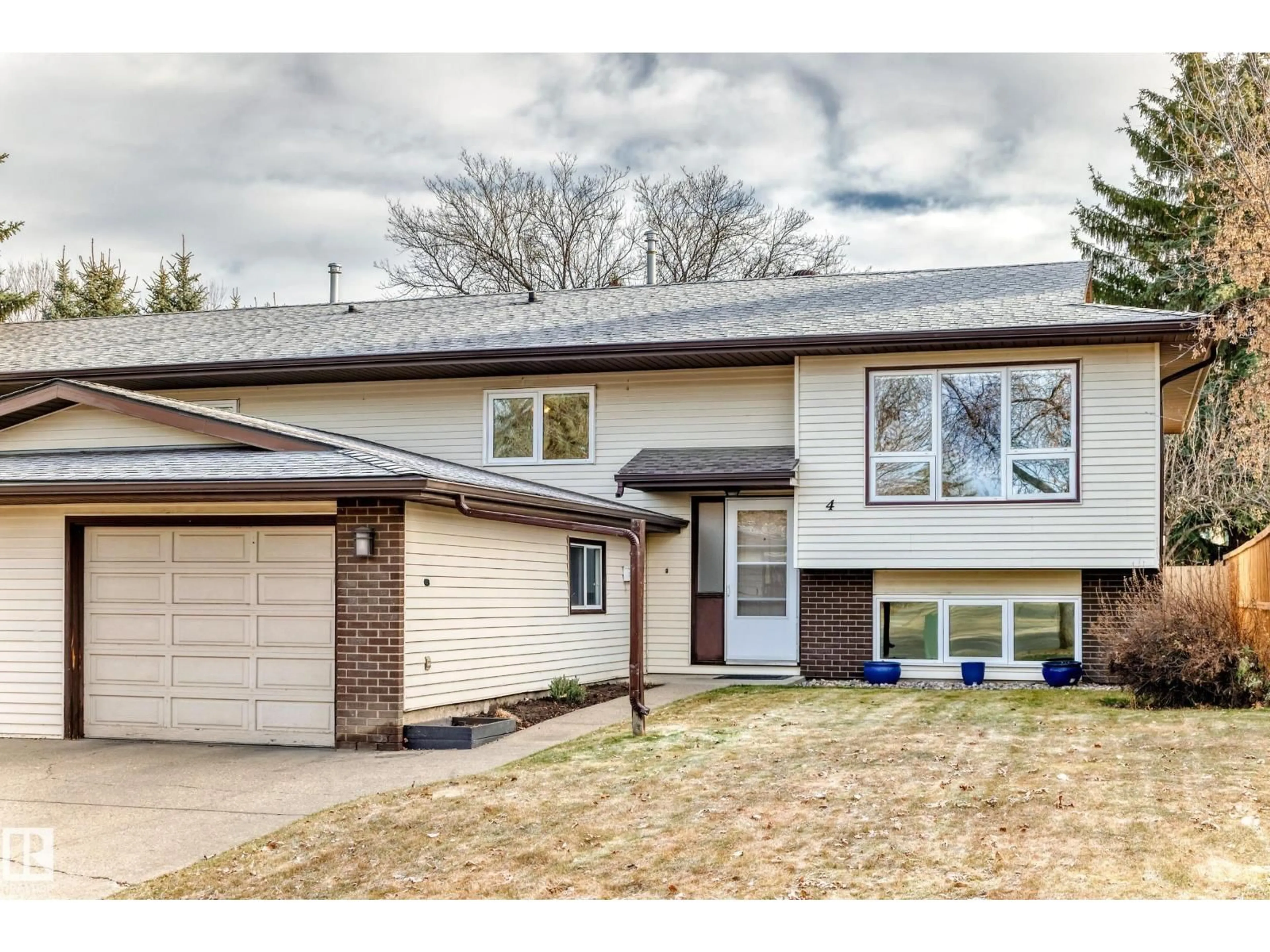 Home with brick exterior material, street for 4 WOODLANDS RD, St. Albert Alberta T8N3L9