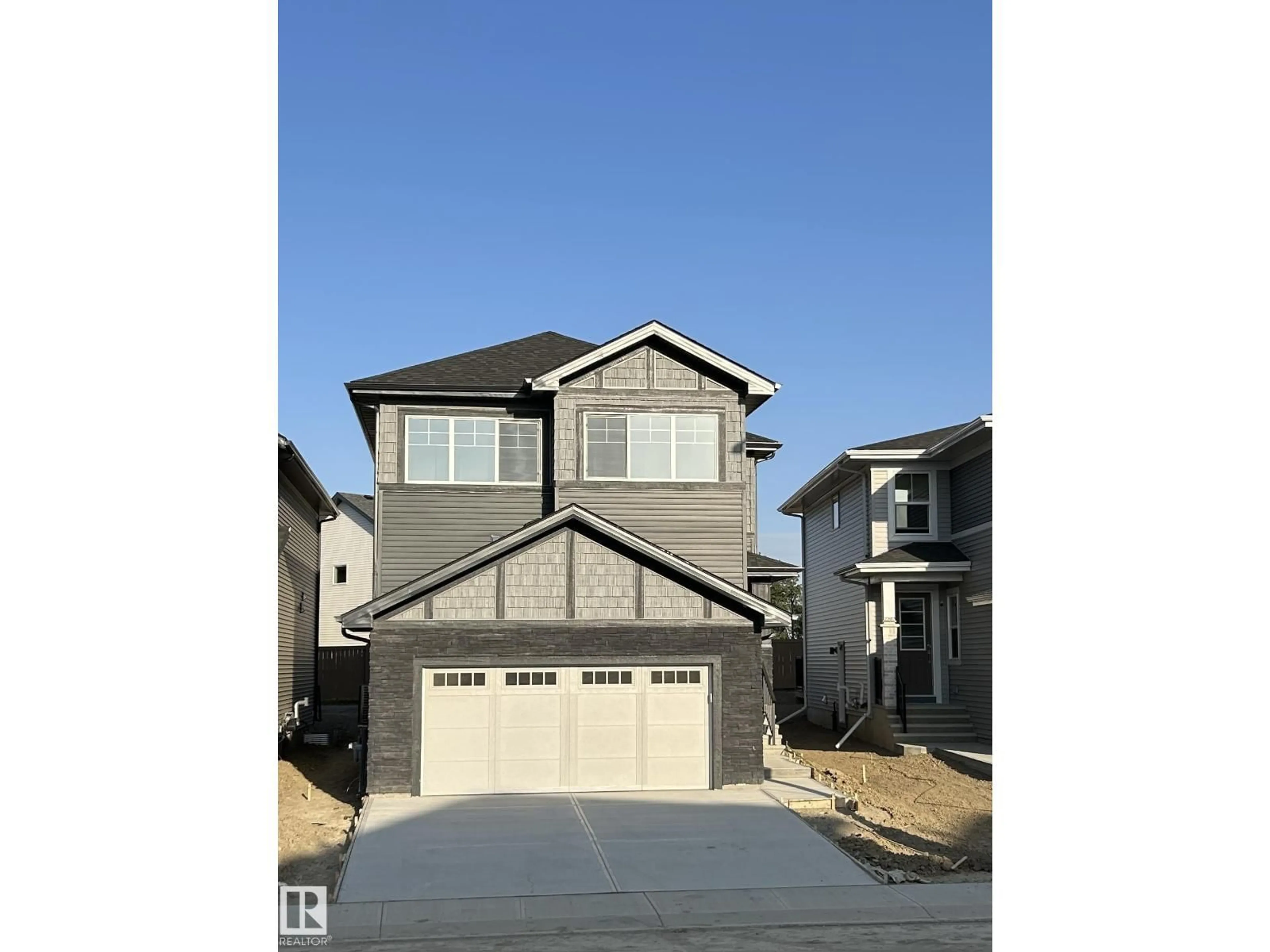 Home with vinyl exterior material, street for SW - 2203 158 ST, Edmonton Alberta T6W5P5
