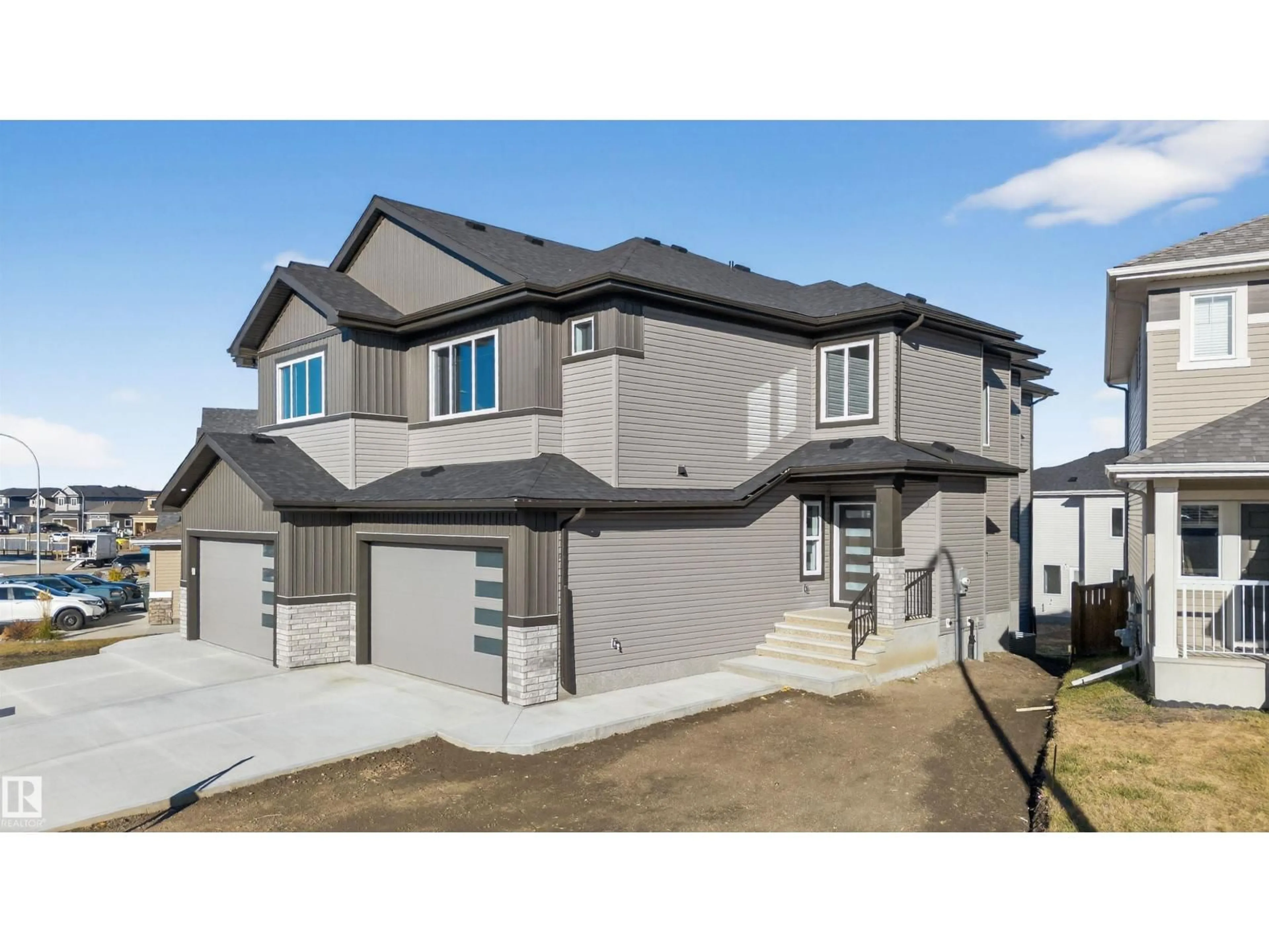 Home with vinyl exterior material, street for WD - 19 HULL, Spruce Grove Alberta T7X0X5