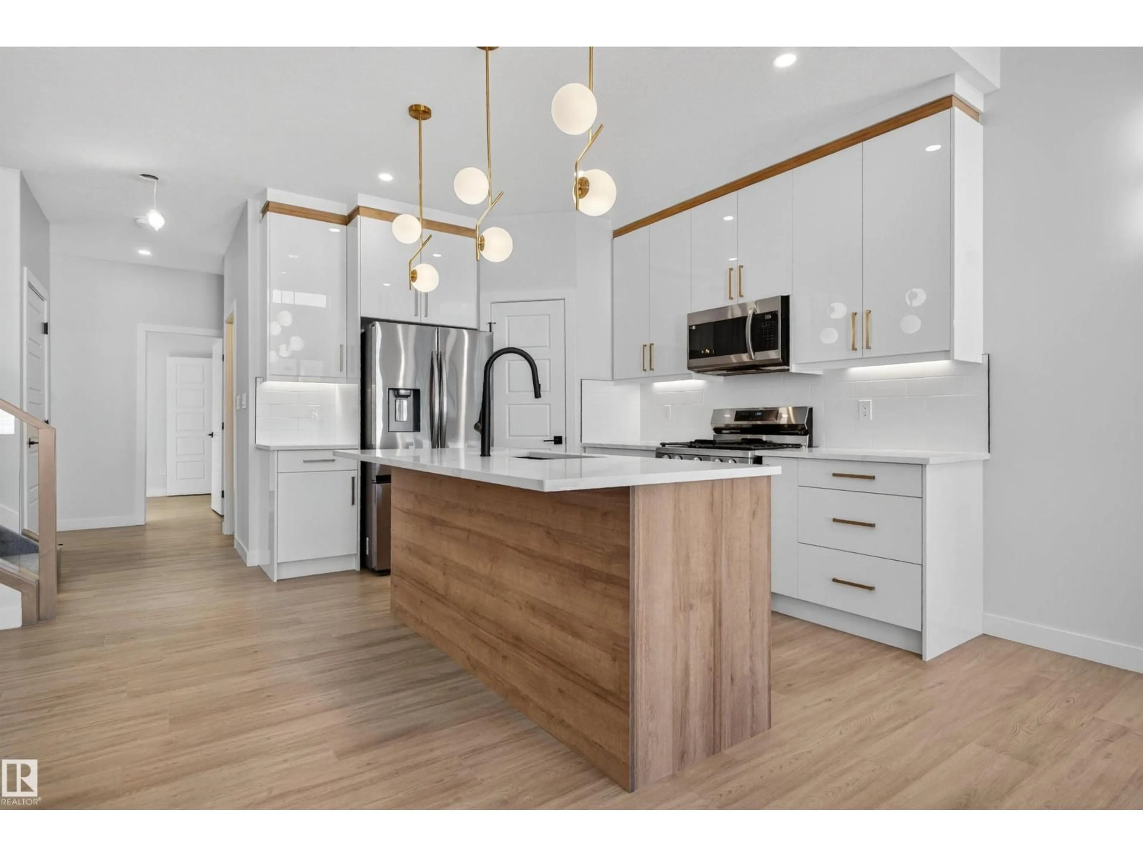 Open concept kitchen, wood/laminate floor for WD - 19 HULL, Spruce Grove Alberta T7X0X5