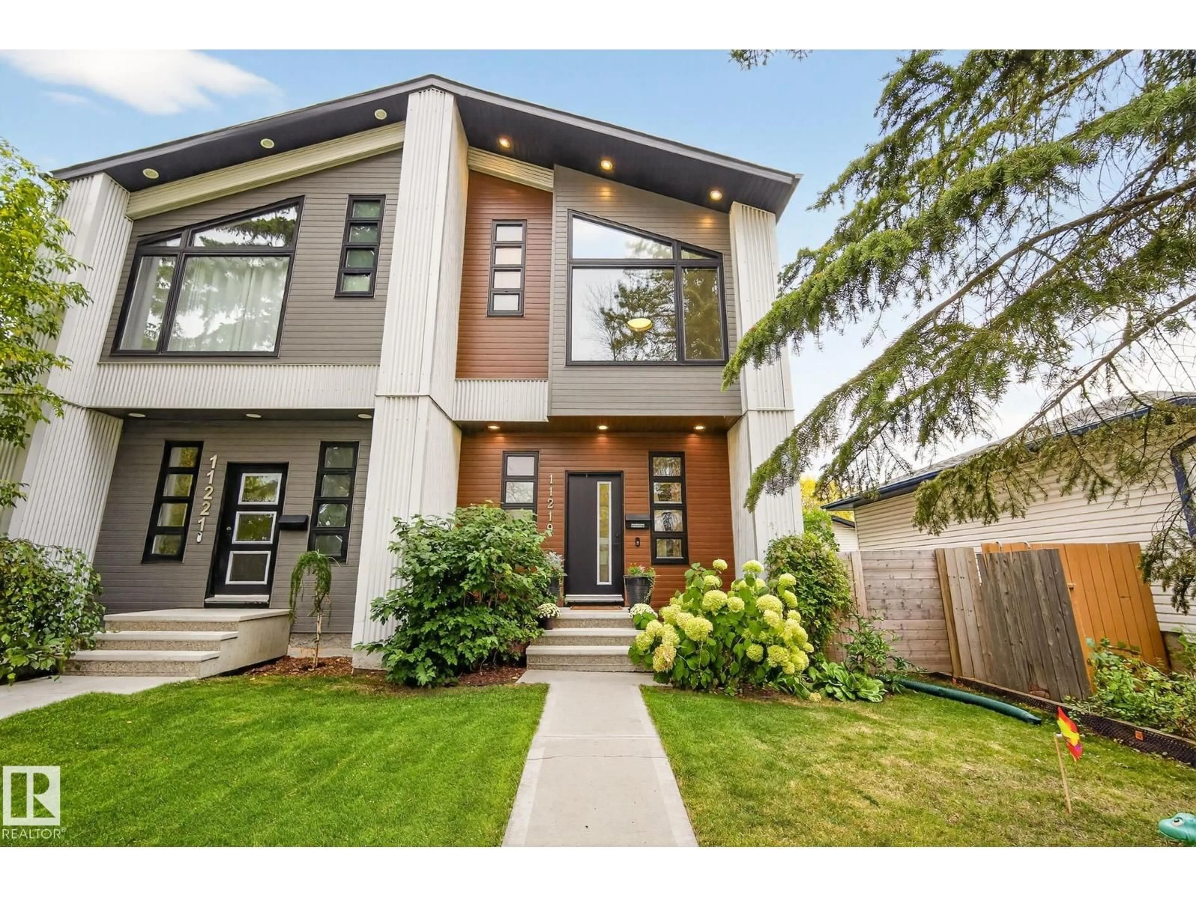 Home with brick exterior material, street for NW - 11219 132 ST, Edmonton Alberta T5M1E7