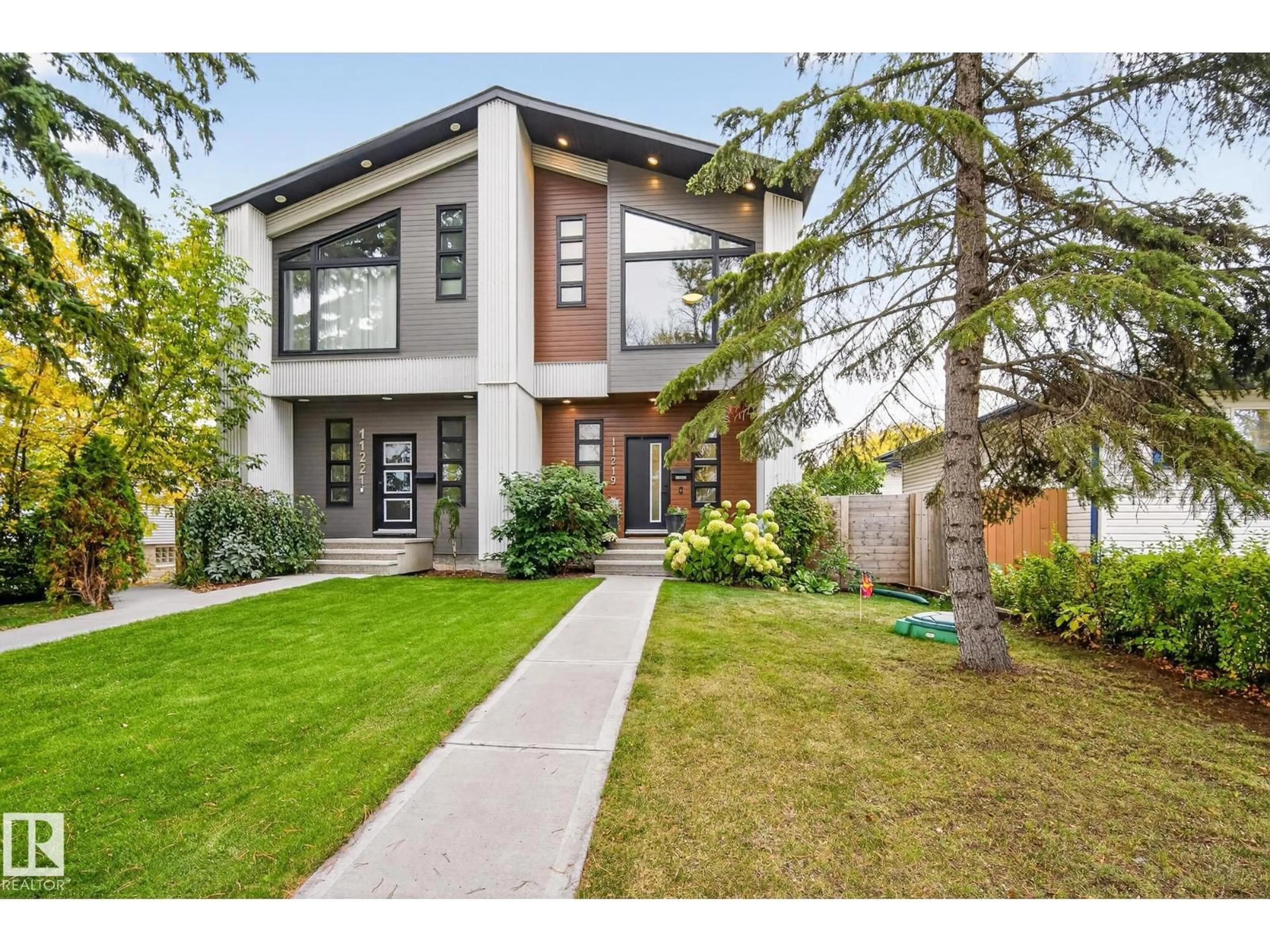 Home with brick exterior material, street for NW - 11219 132 ST, Edmonton Alberta T5M1E7