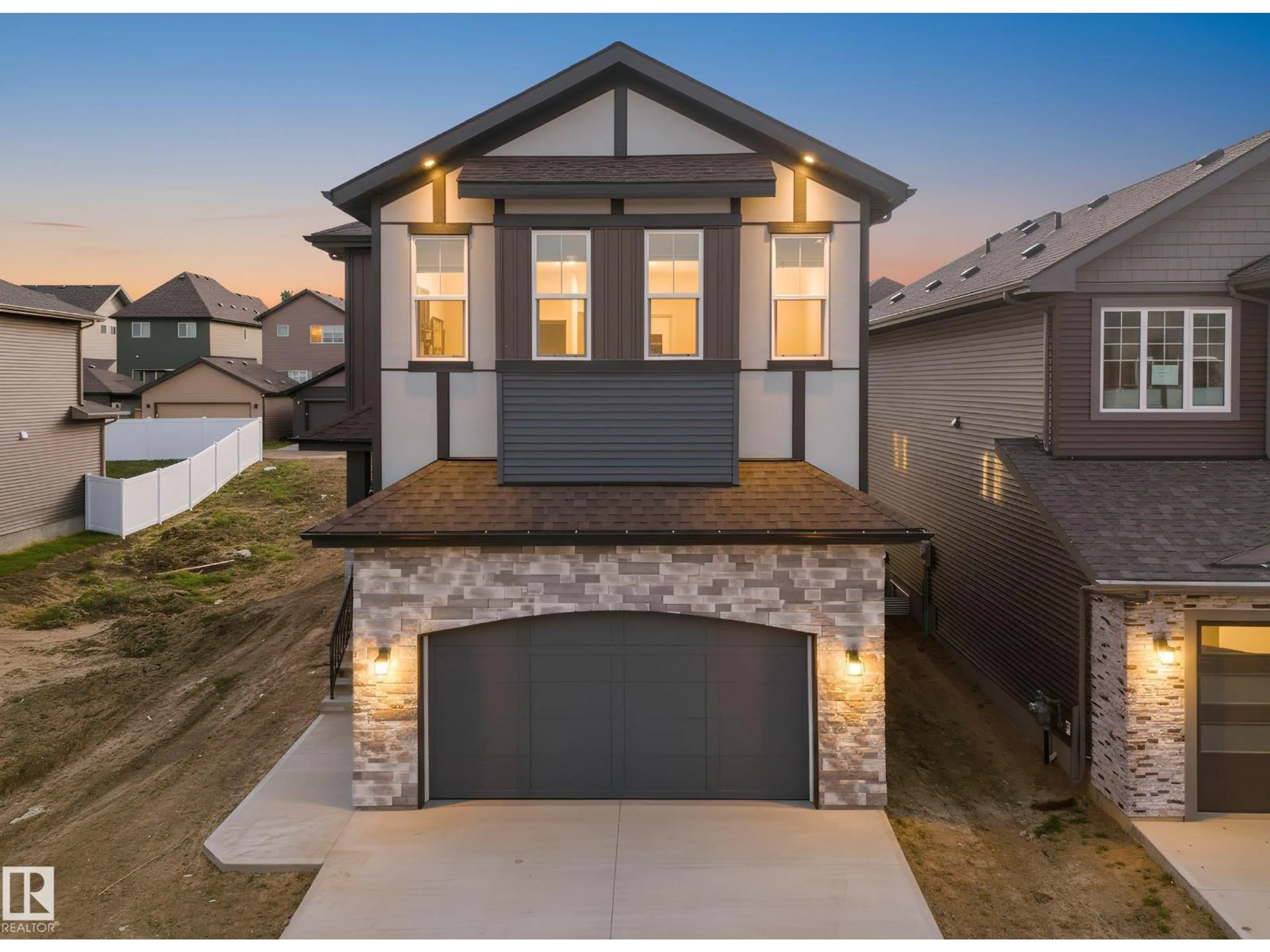 Home with brick exterior material, street for 1113 GYRFALCON CR, Edmonton Alberta T5S0S5