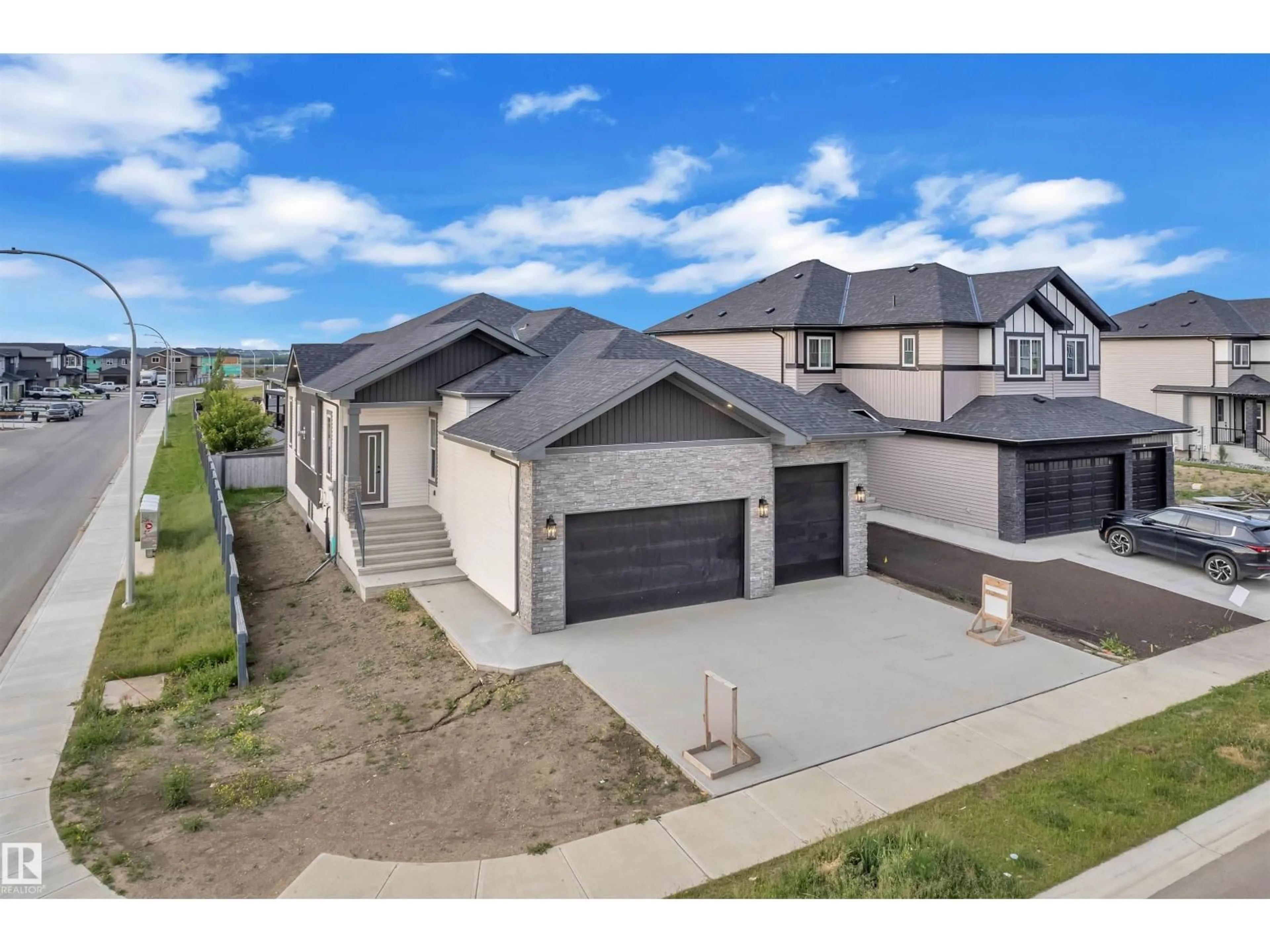 A pic from outside/outdoor area/front of a property/back of a property/a pic from drone, street for 30 AVONLEA WY, Spruce Grove Alberta T7X0Y3