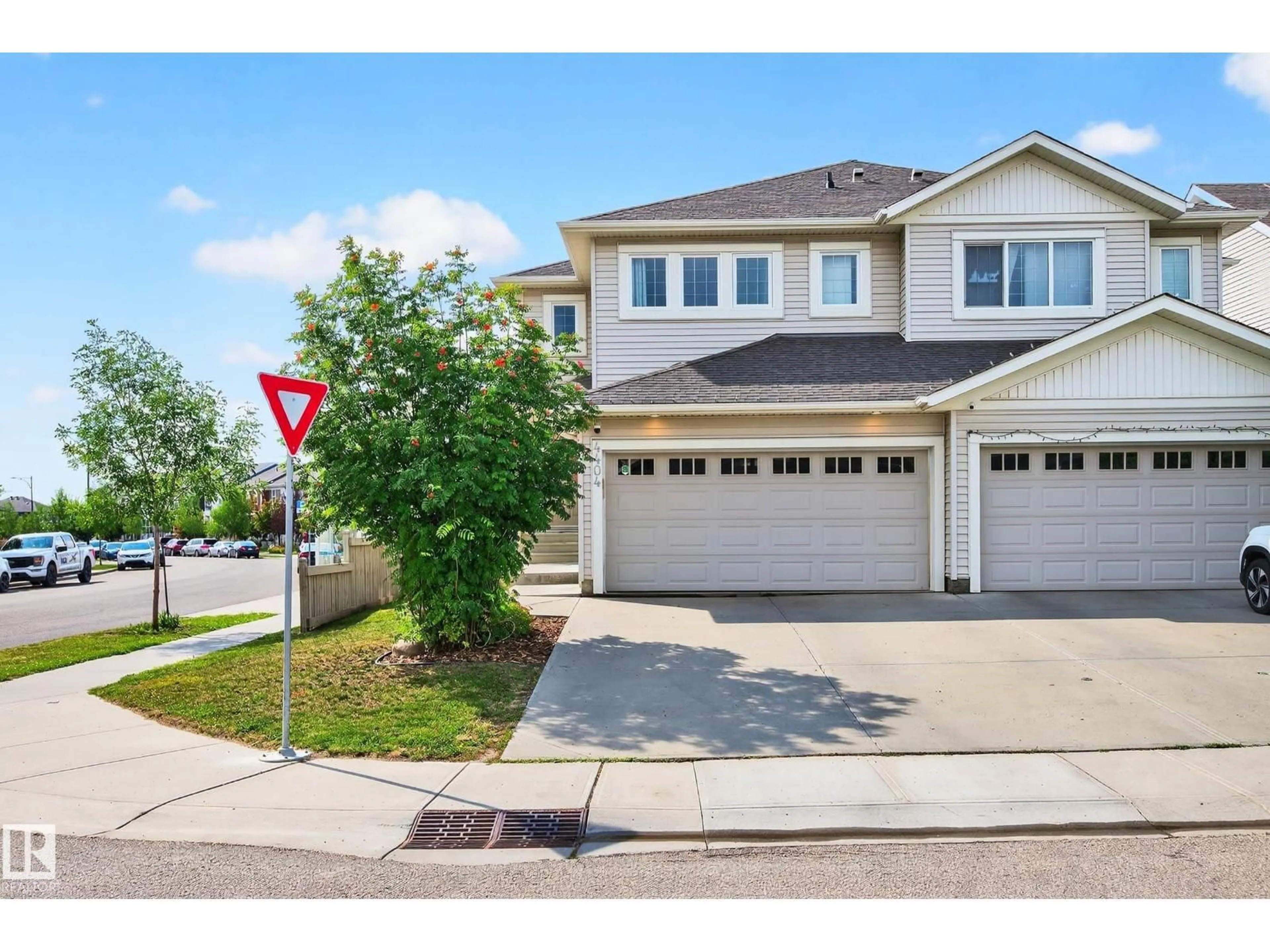 Home with vinyl exterior material, street for 4404 6 ST, Edmonton Alberta T6T0Z8