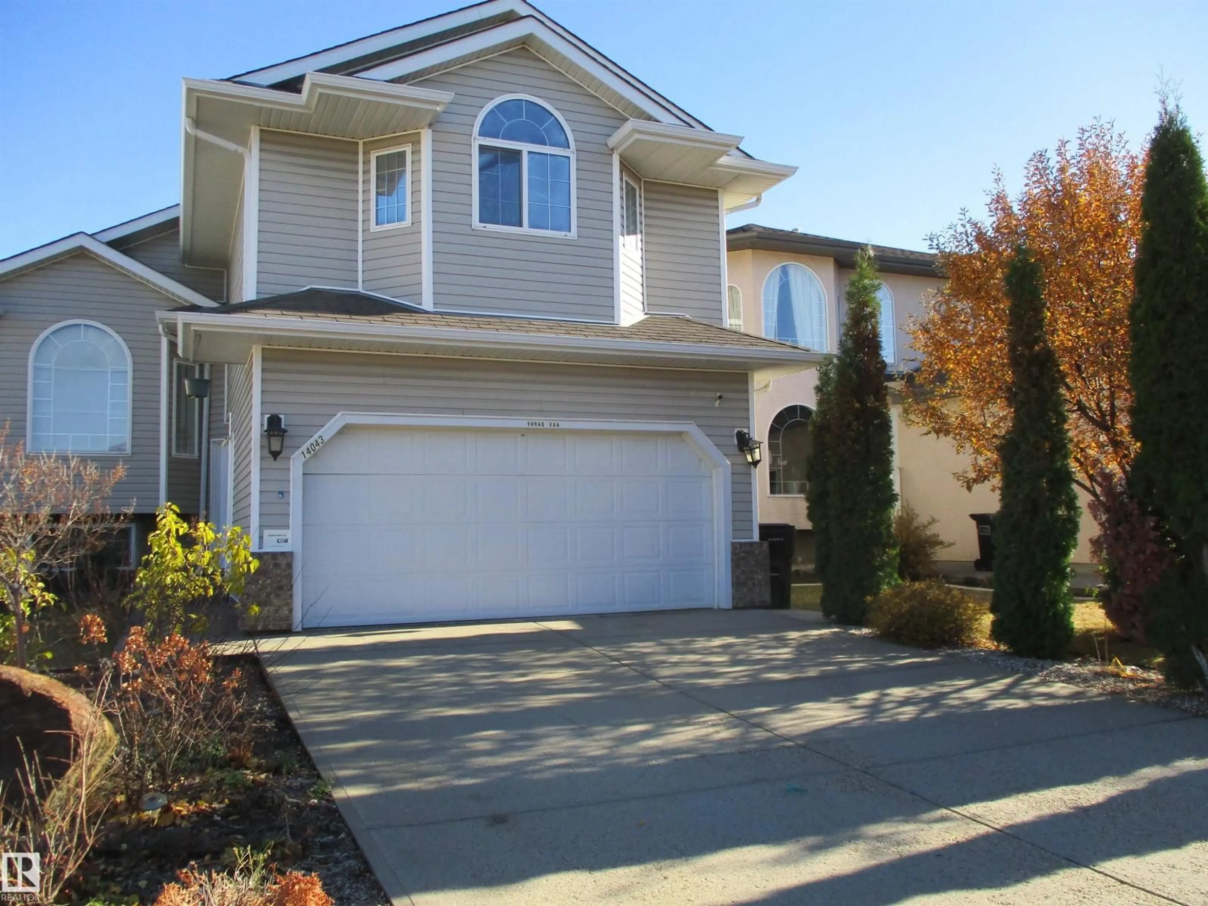 Home with vinyl exterior material, street for NW - 14043 134 ST, Edmonton Alberta T6V1W3