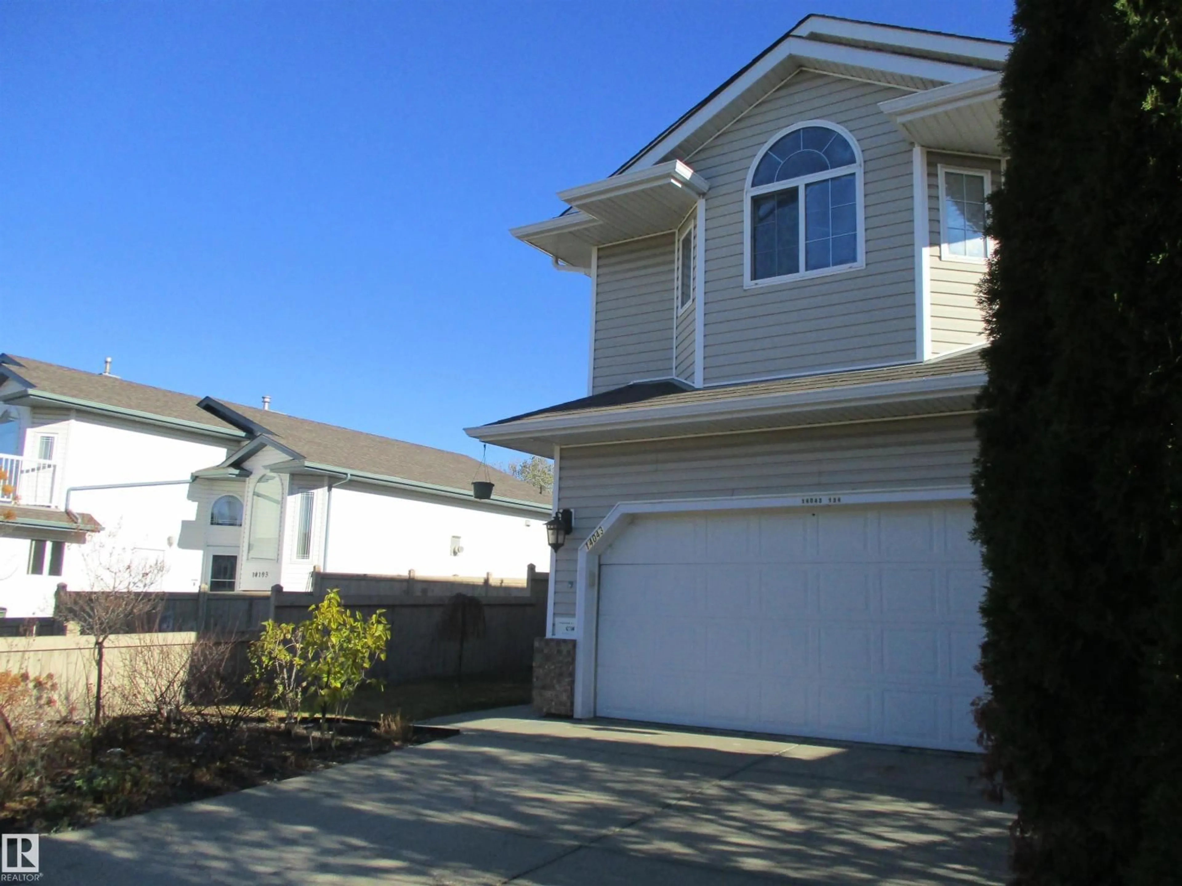 Home with vinyl exterior material, street for NW - 14043 134 ST, Edmonton Alberta T6V1W3