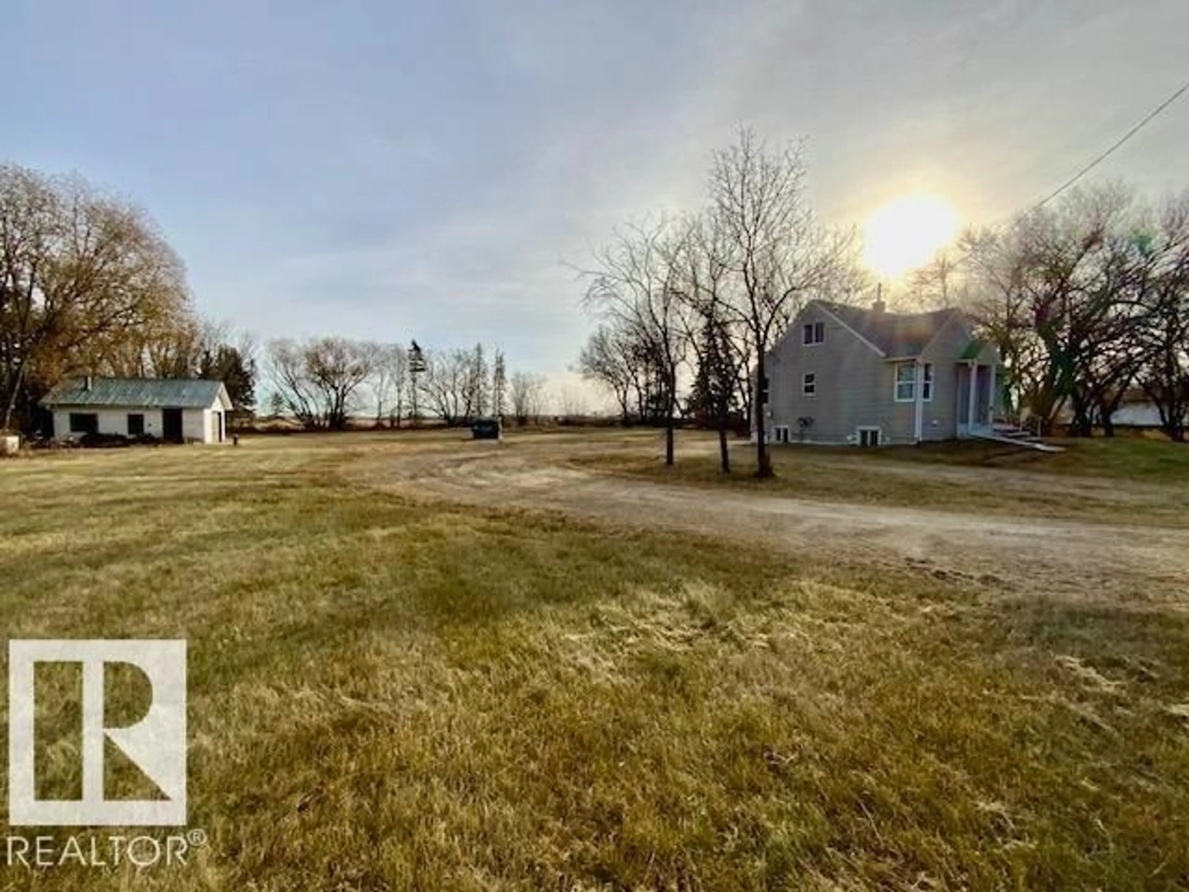 A pic from outside/outdoor area/front of a property/back of a property/a pic from drone, unknown for 460073 HWY 2 A, Rural Wetaskiwin County Alberta T9A1X1