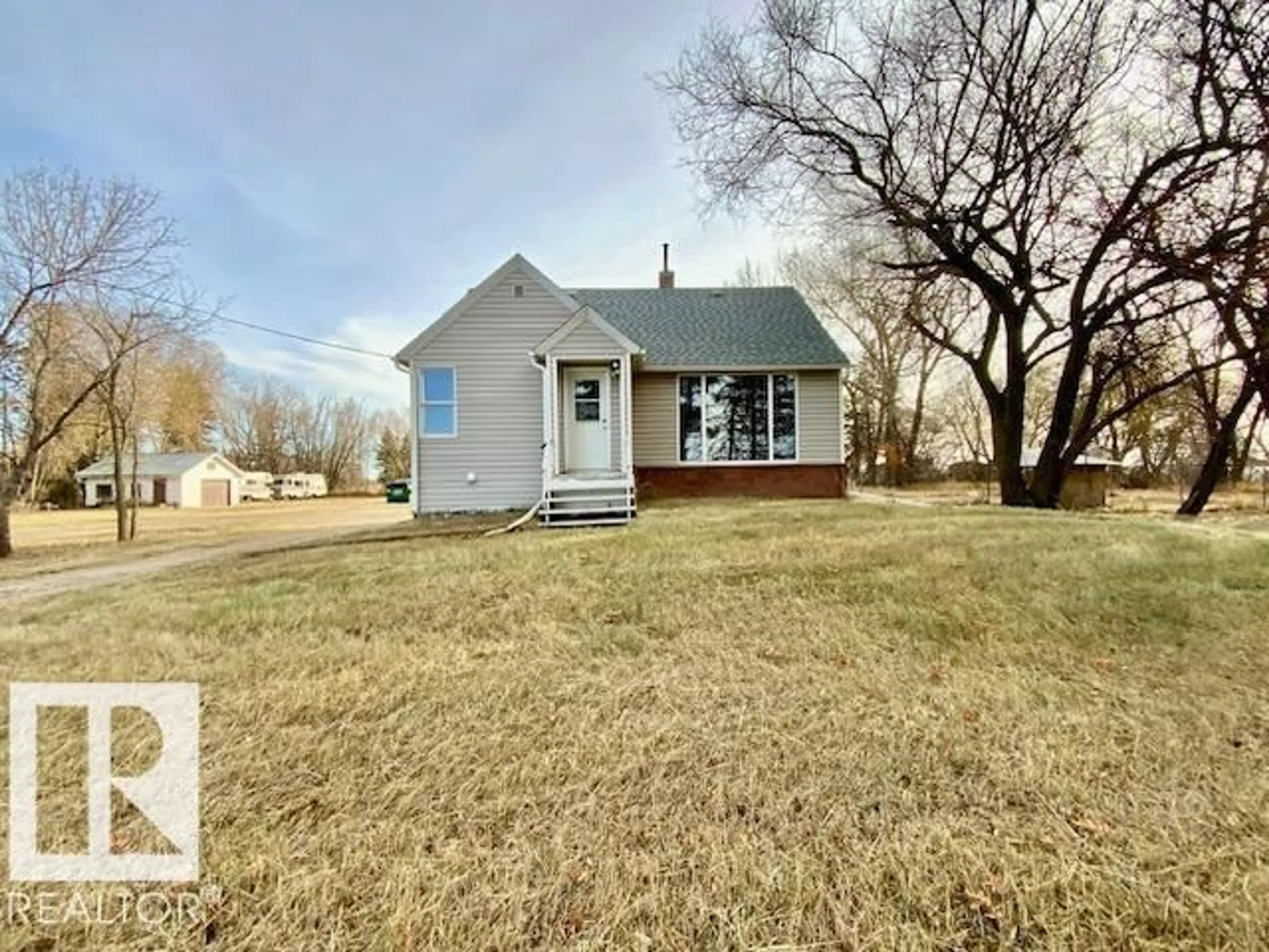 A pic from outside/outdoor area/front of a property/back of a property/a pic from drone, street for 460073 HWY 2 A, Rural Wetaskiwin County Alberta T9A1X1