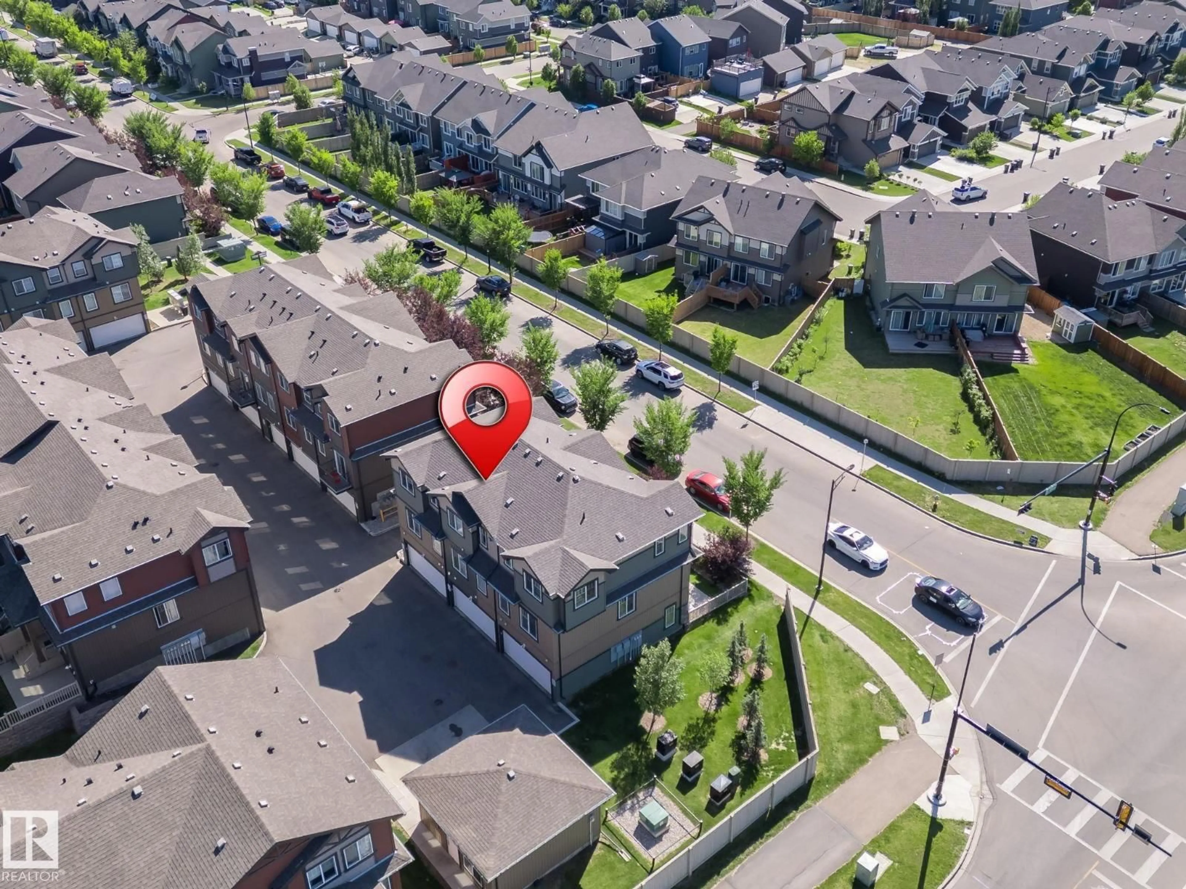 A pic from outside/outdoor area/front of a property/back of a property/a pic from drone, street for #2 - 3305 ORCHARDS LINK LI, Edmonton Alberta T6X2H1