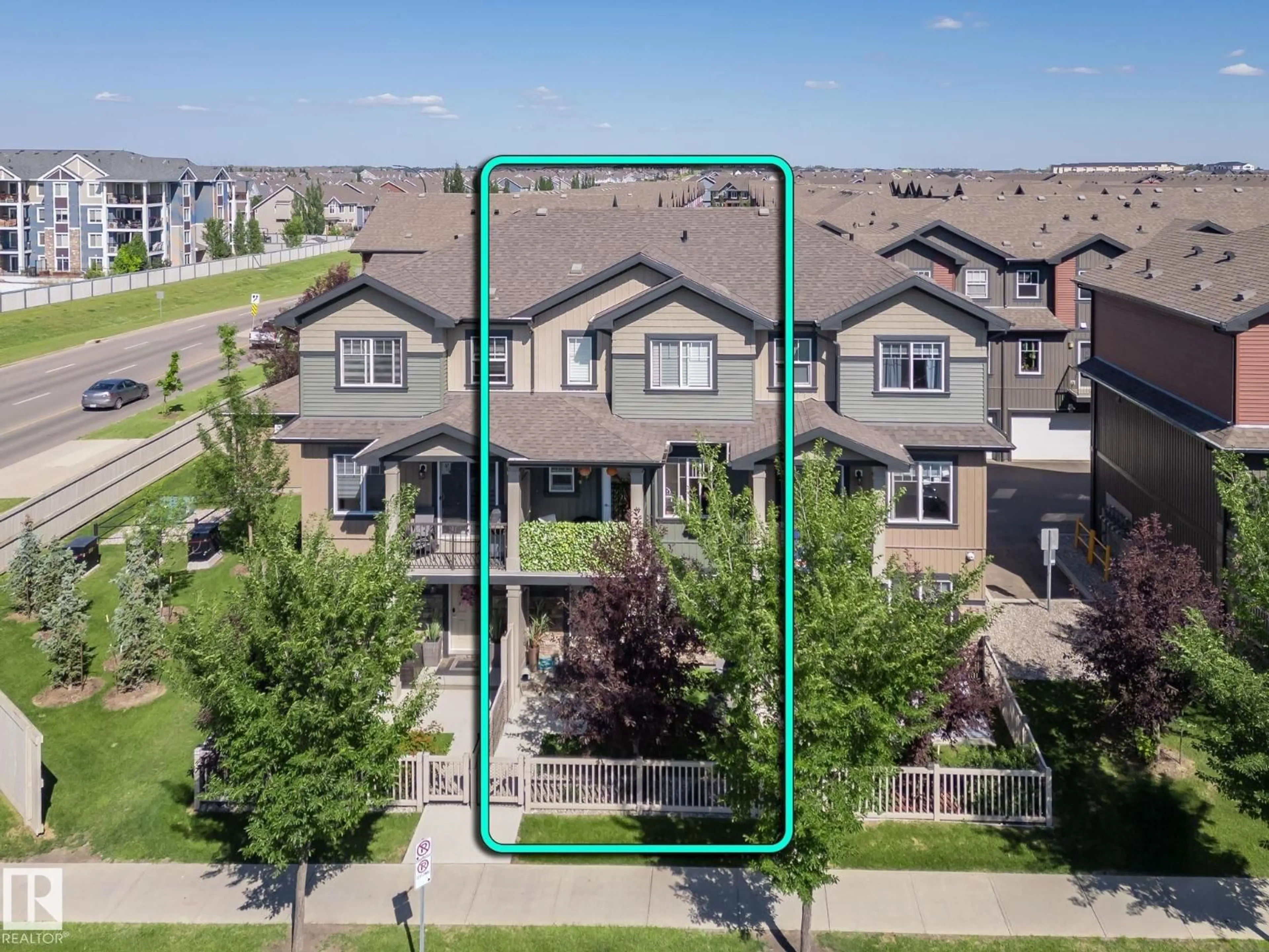 A pic from outside/outdoor area/front of a property/back of a property/a pic from drone, street for #2 - 3305 ORCHARDS LINK LI, Edmonton Alberta T6X2H1