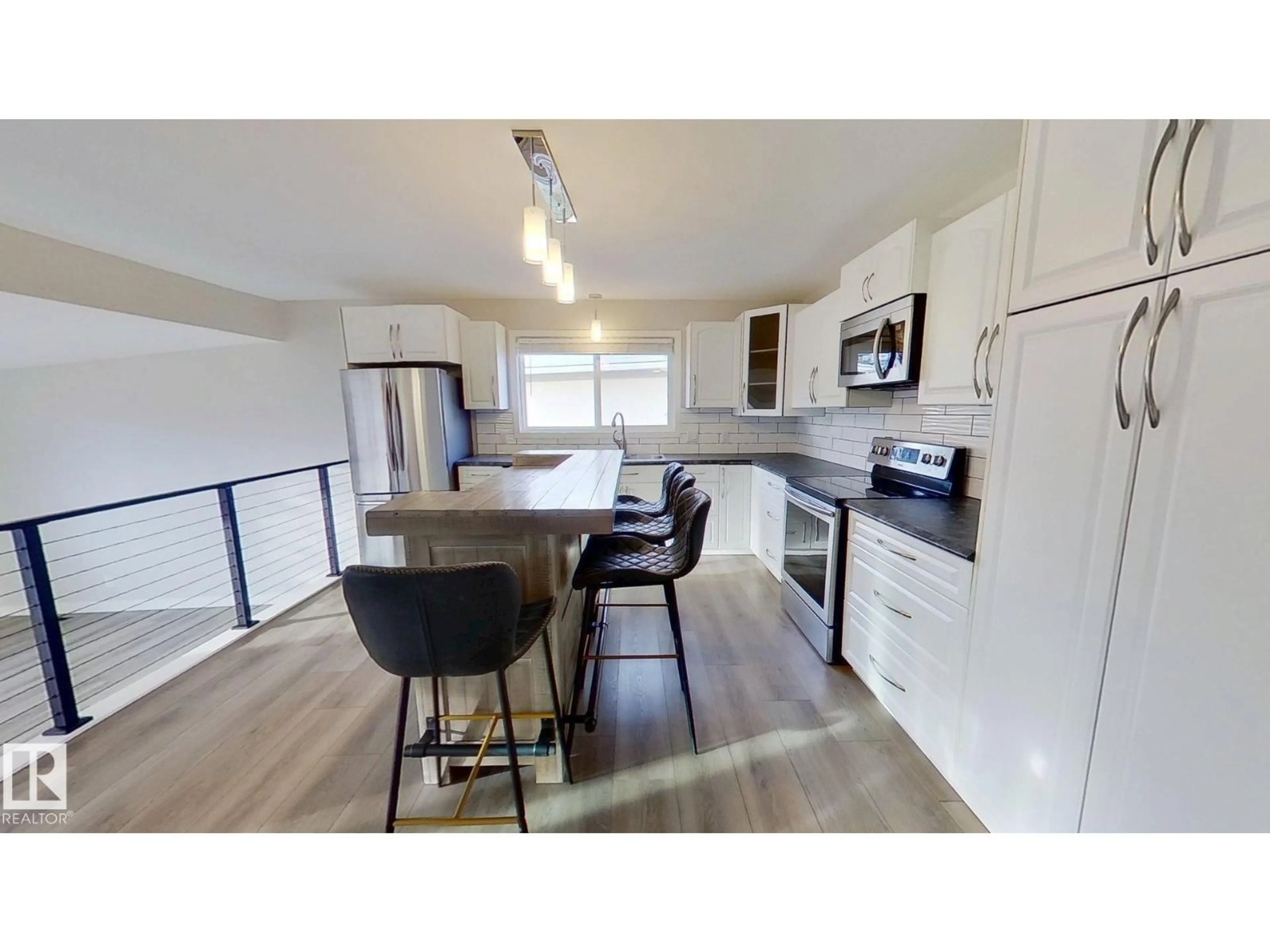 Open concept kitchen, unknown for 4525 51 ST, Vegreville Alberta T9C1L6