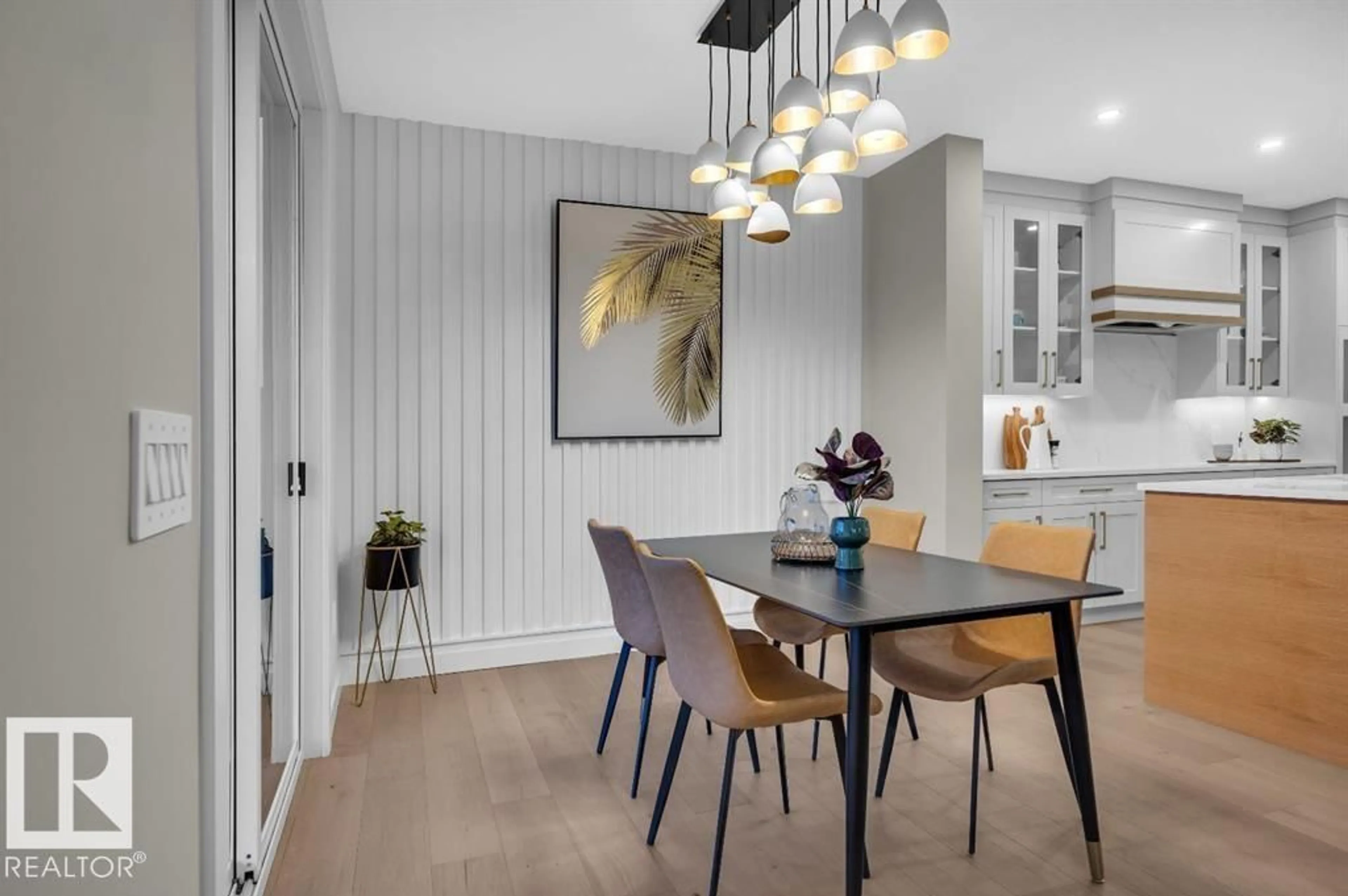Dining room, wood/laminate floor for 1127 GYRFALCON CR, Edmonton Alberta T5S0S5
