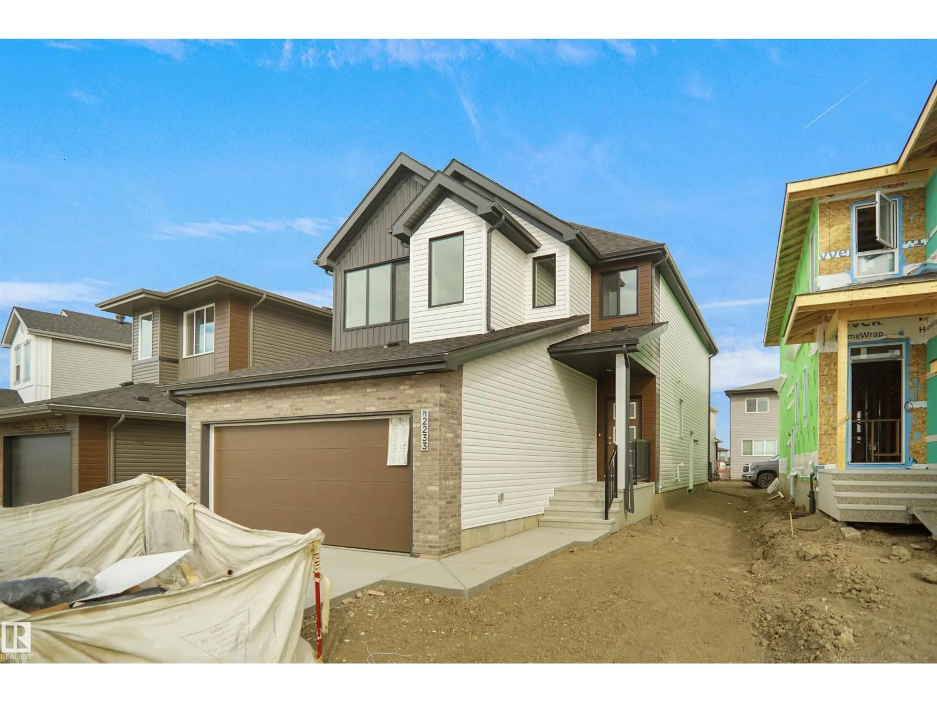 Home with brick exterior material, street for NW - 2233 194A ST, Edmonton Alberta T6M3B6