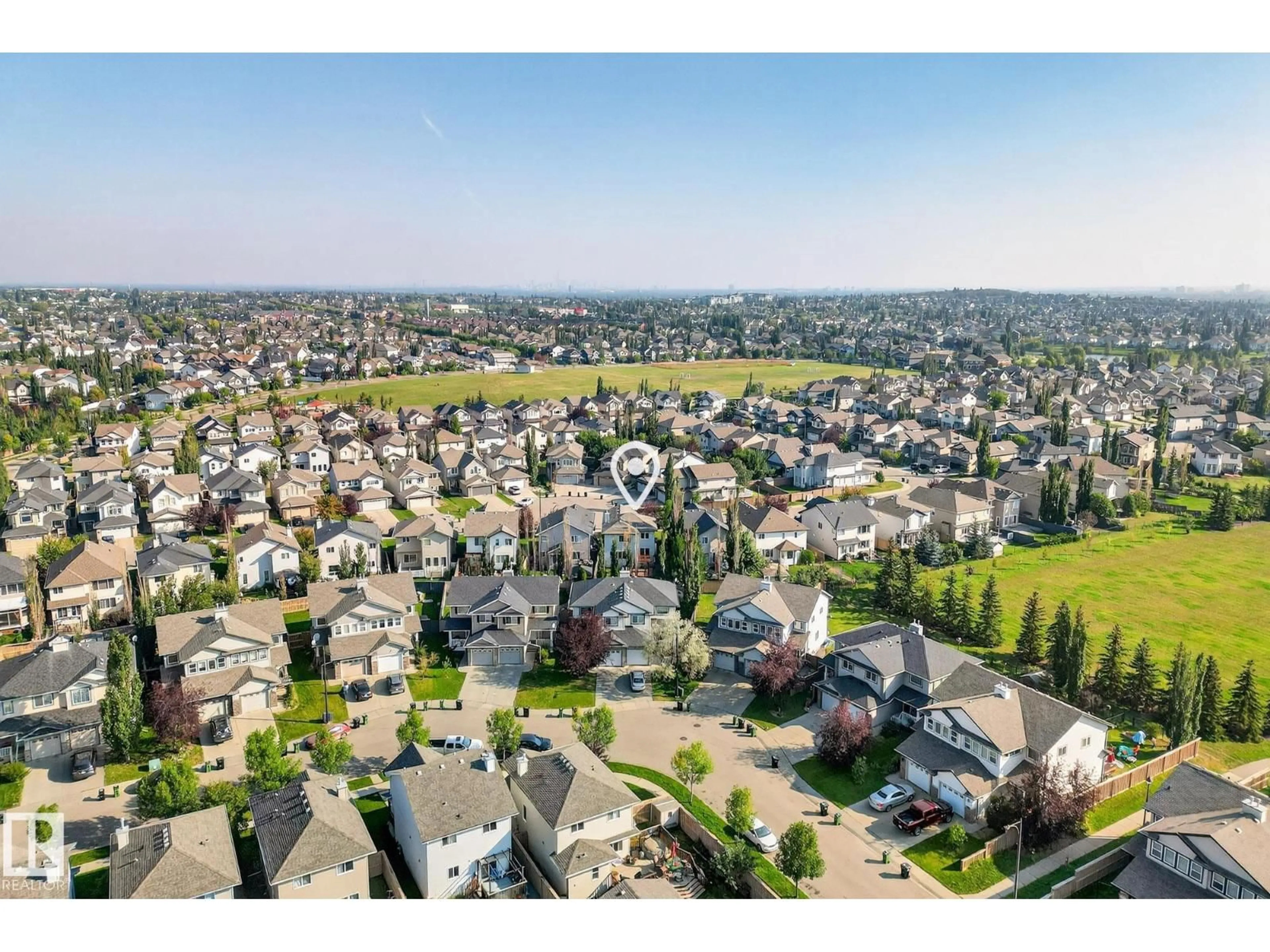 A pic from outside/outdoor area/front of a property/back of a property/a pic from drone, unknown for 8429 SLOANE CR, Edmonton Alberta T6R0L3