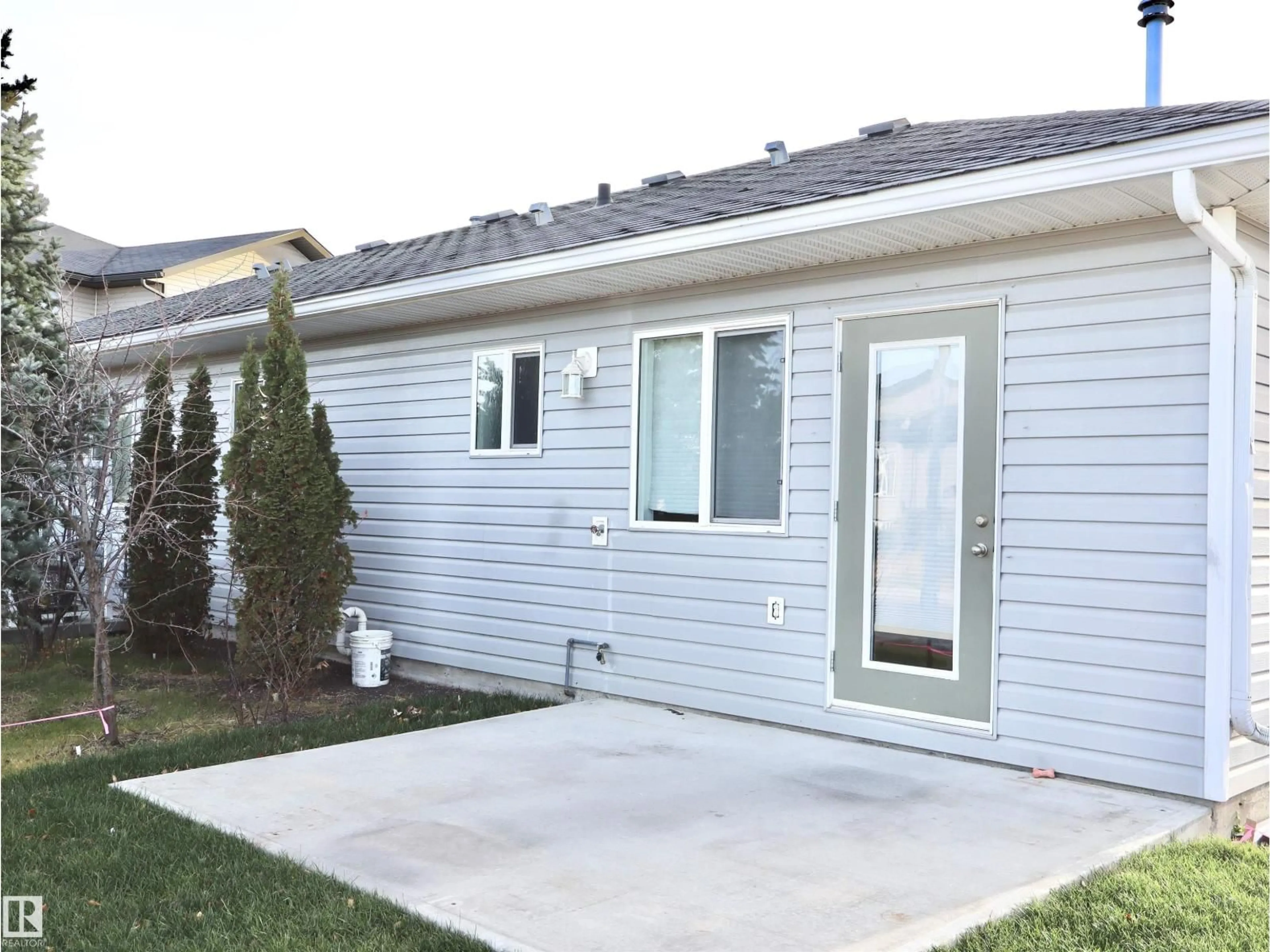 Home with vinyl exterior material, street for #7 - 5831 46 STREET, Barrhead Alberta T7N0A4