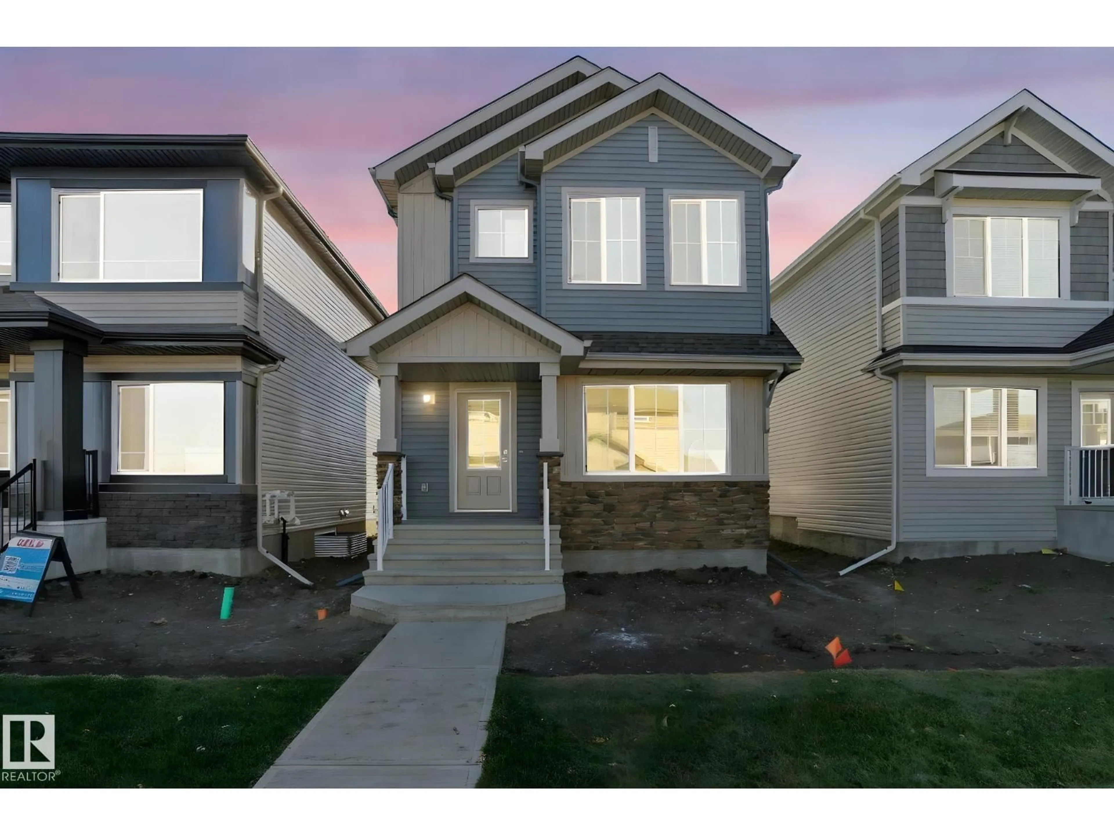Home with vinyl exterior material, street for 67 SERENO LN, Fort Saskatchewan Alberta T8L0Z9