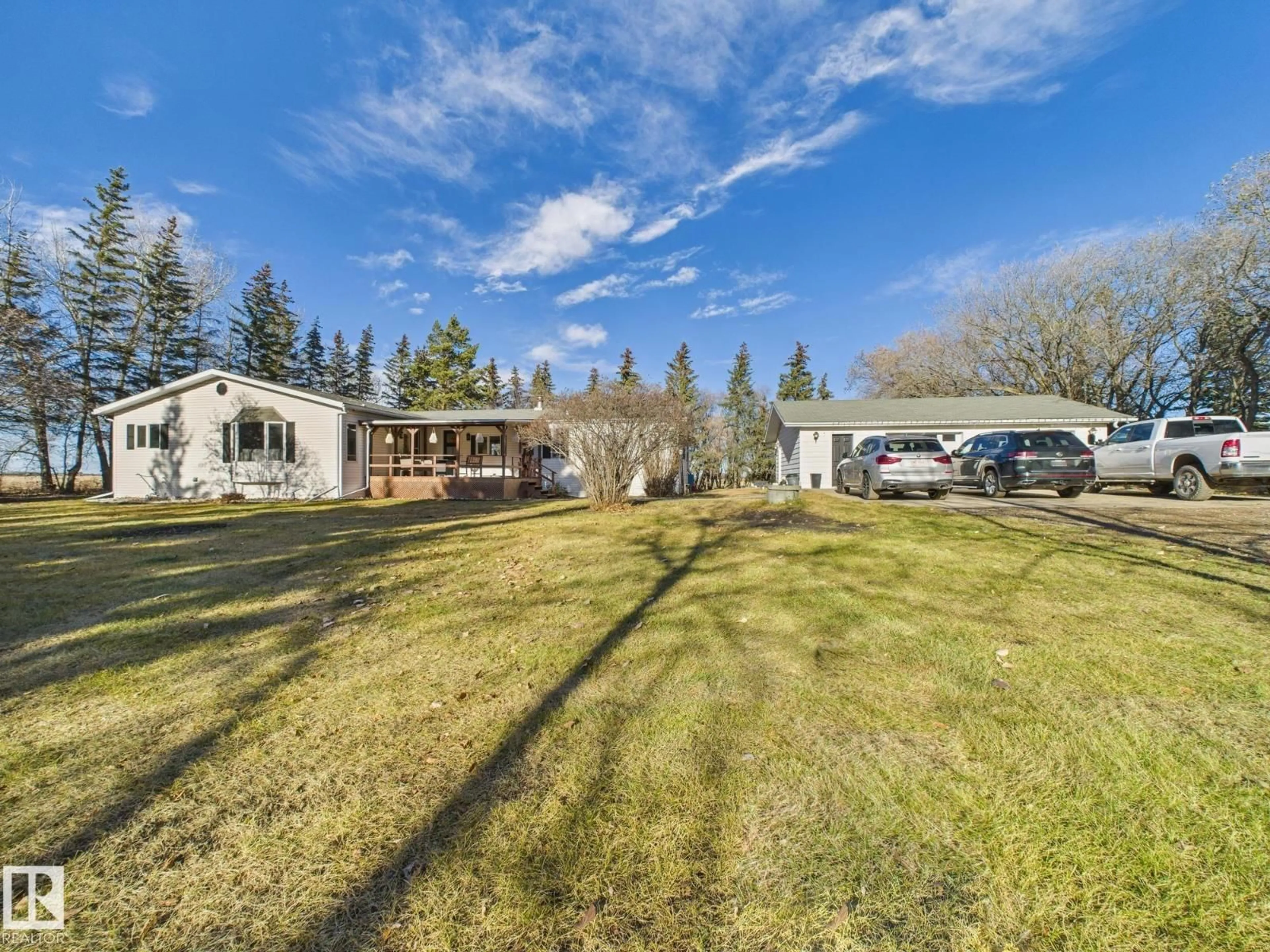 A pic from outside/outdoor area/front of a property/back of a property/a pic from drone, unknown for 25318 TWP ROAD 552, Rural Sturgeon County Alberta T8K1P4