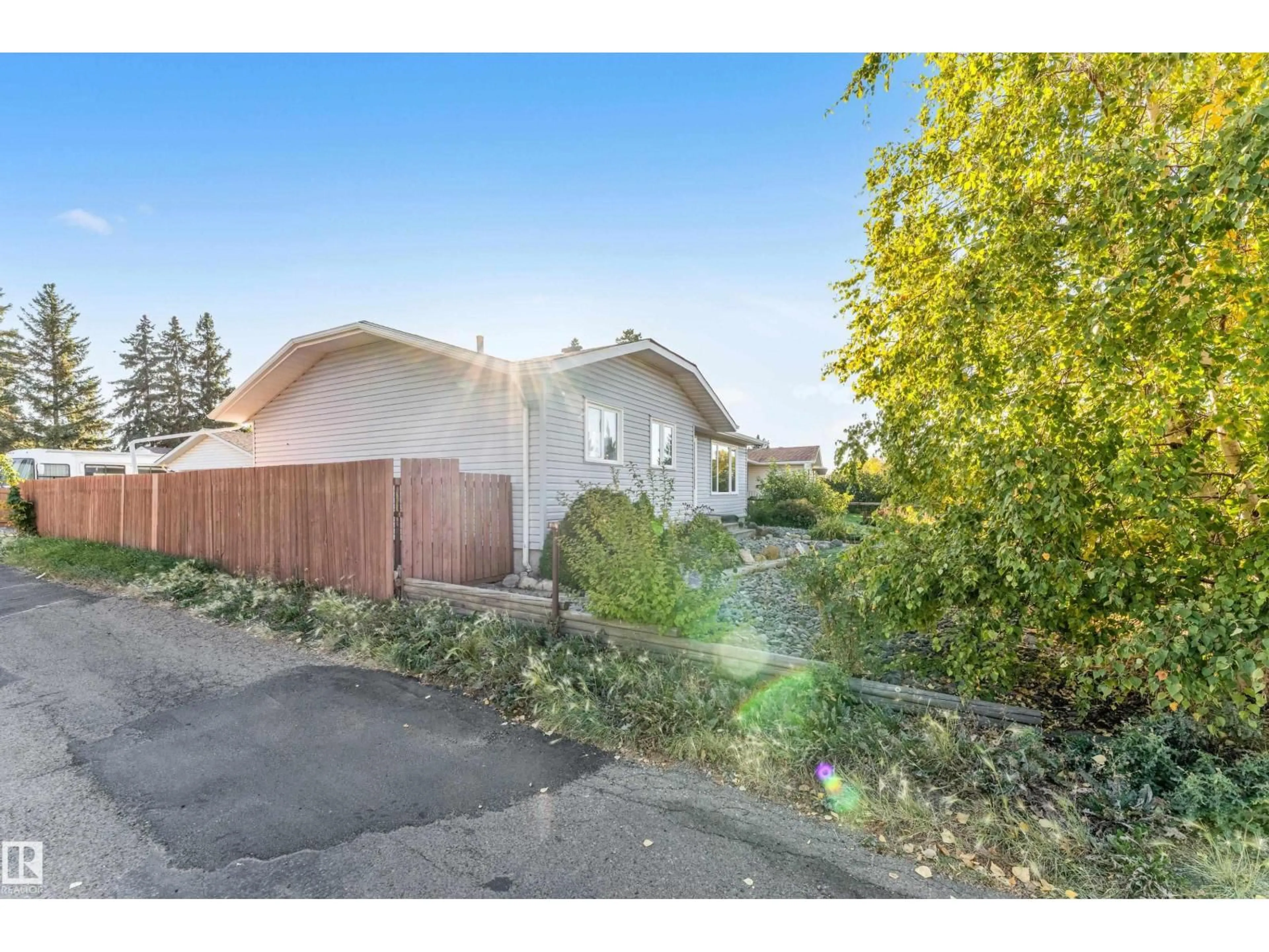 A pic from outside/outdoor area/front of a property/back of a property/a pic from drone, street for 8103 14 AV, Edmonton Alberta T6K1X3