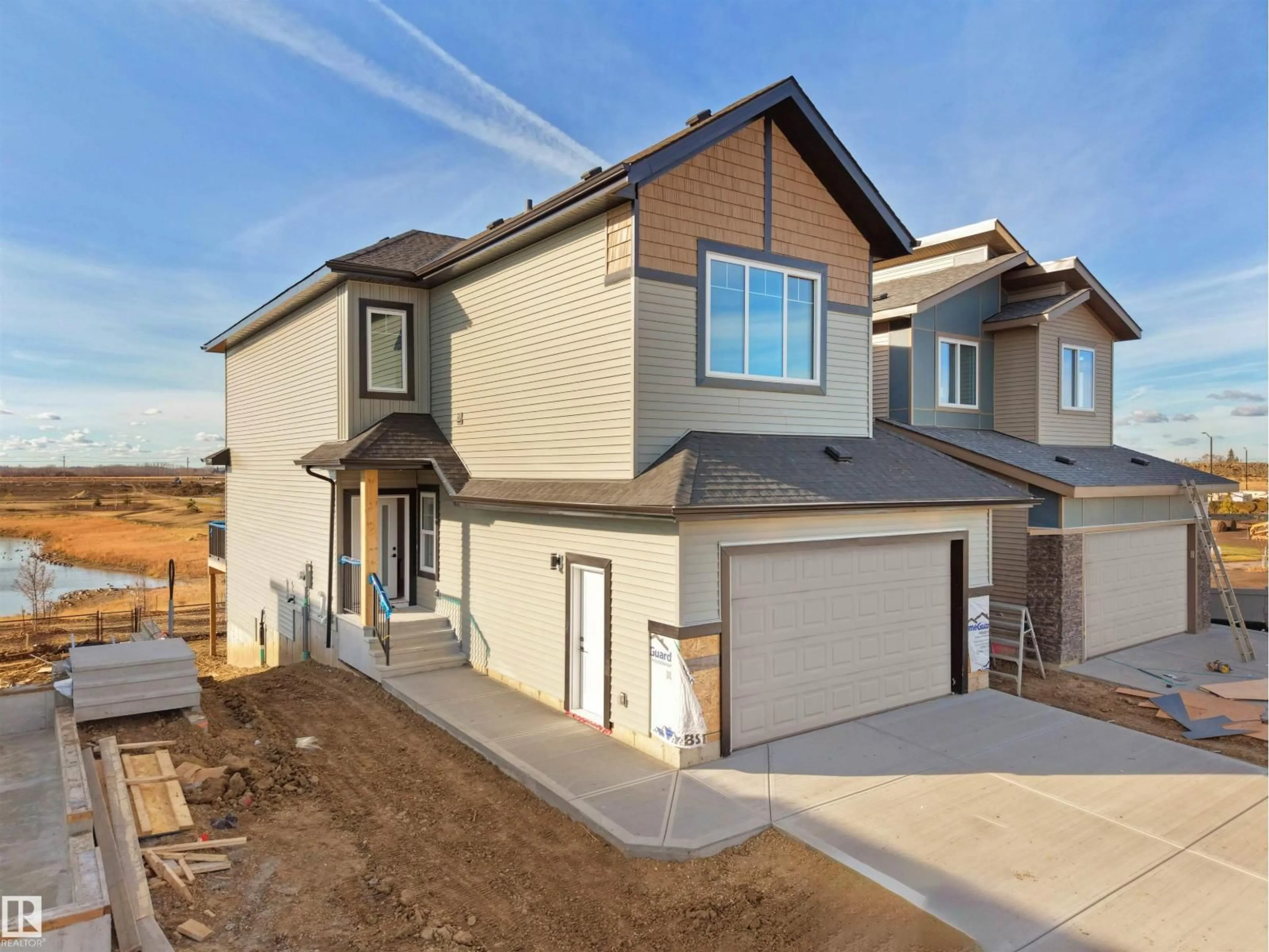 Home with brick exterior material, street for 203 CRYSTAL CREEK DR, Leduc Alberta T9E0X6