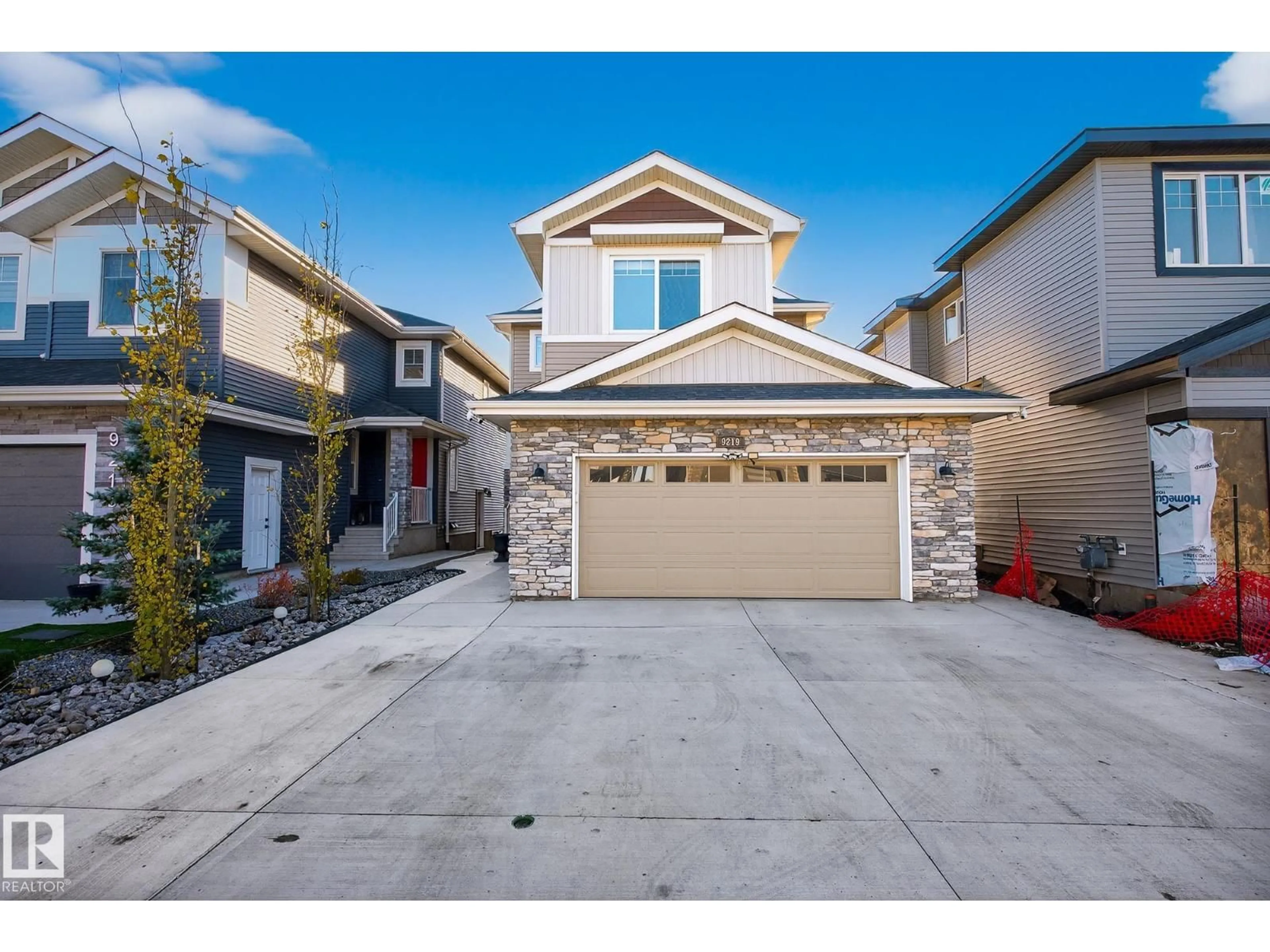 Home with vinyl exterior material, street for 9219 183 AV, Edmonton Alberta T5Z0S6