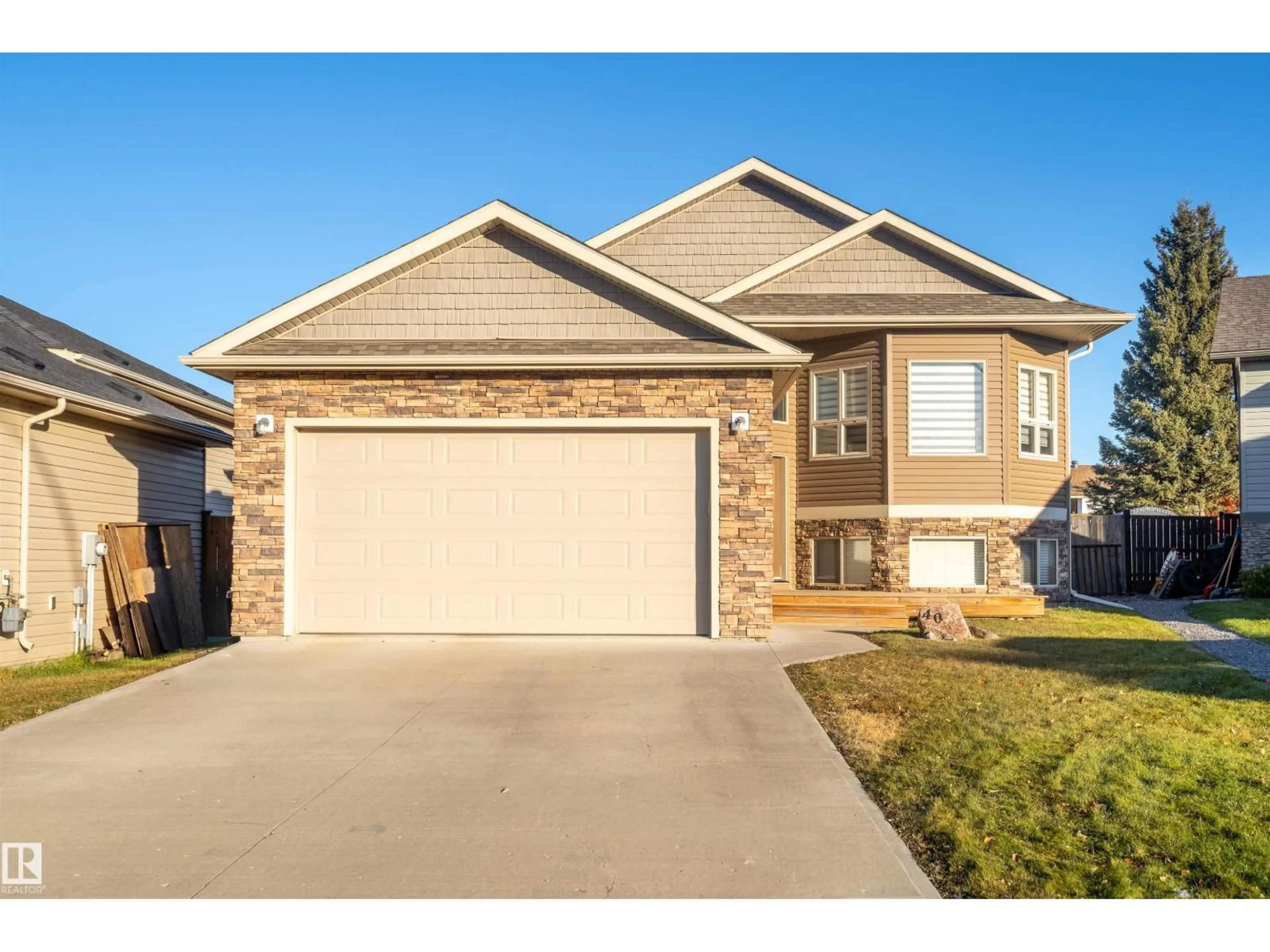Home with vinyl exterior material, street for 40 FALCON RD, Cold Lake Alberta T9M0G4